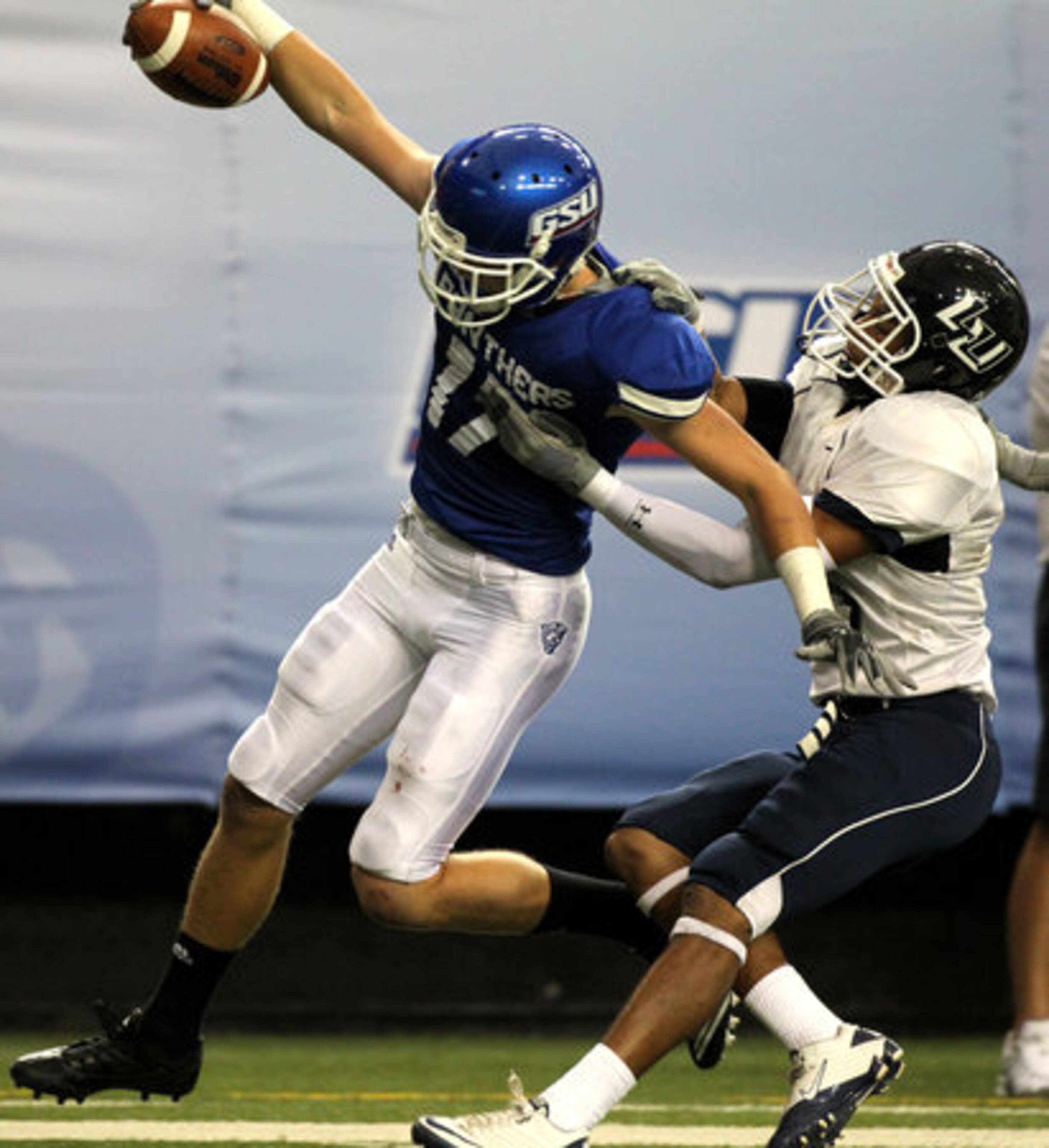 Georgia State University wide receiver Danny Williams stretches for the goal line as he scores a 39-yard touchdown in the second half of their game against Lambuth Saturday afternoon at the Georgia Dome in Atlanta, Ga., Sept. 11, 2010. Lambuth defeated GSU 23-14.