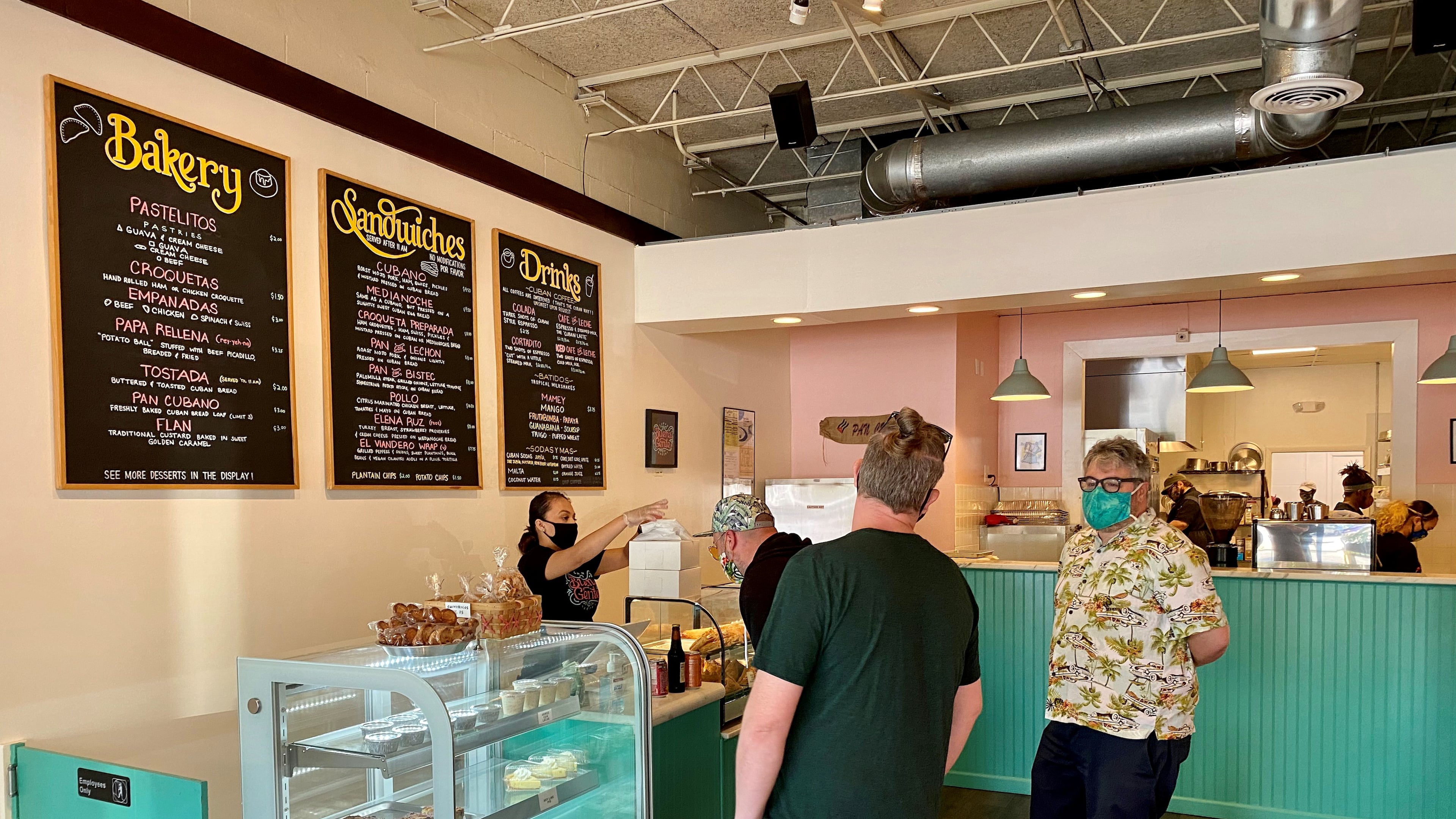 Customers ogle the pastry case at Buena Gente Cuban Bakery on Clairmont Road.
Wendell Brock for The Atlanta Journal-Constitution