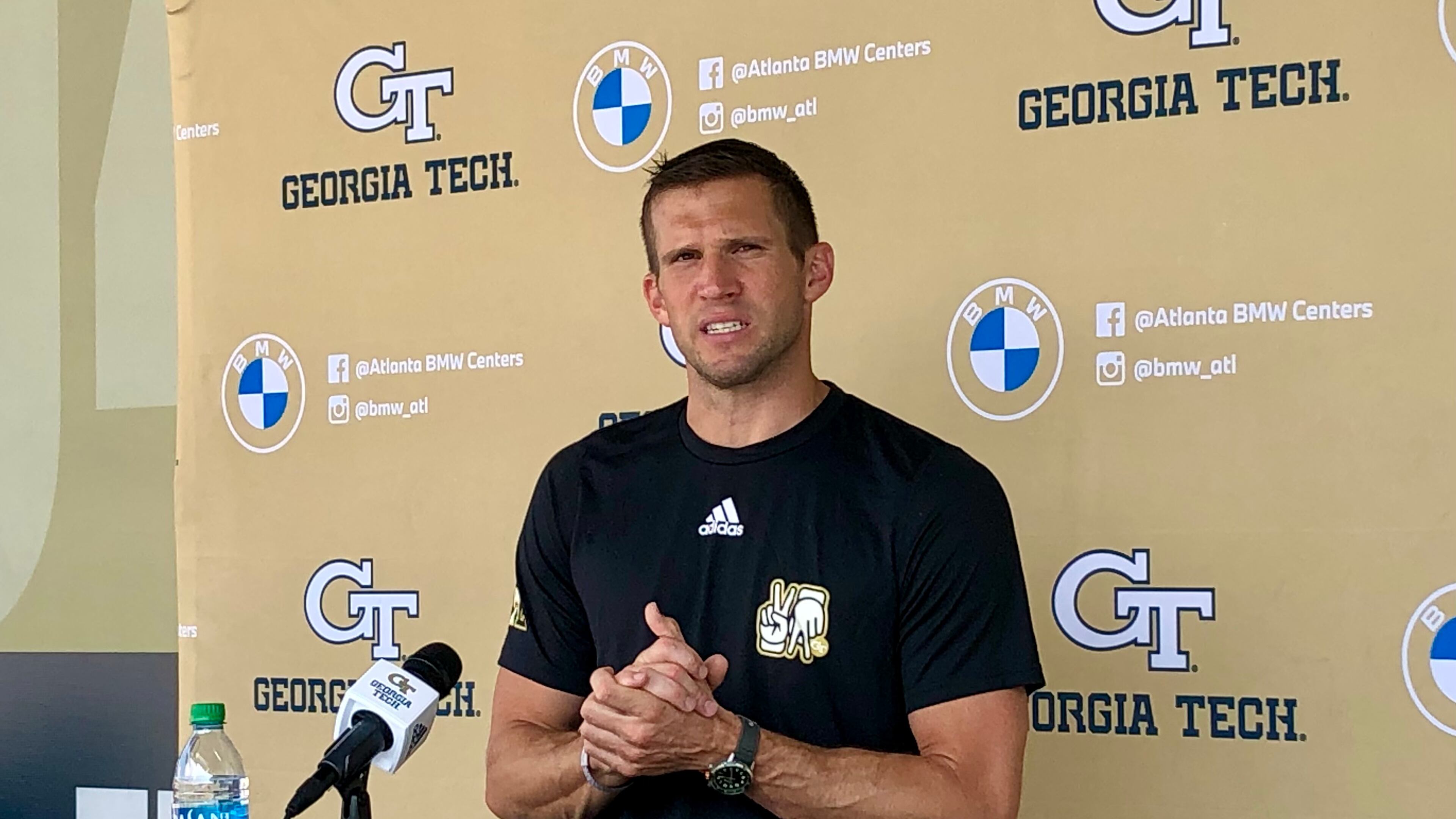 Georgia Tech defensive coordinator Andrew Thacker speaks to the media following a preseason practice on August 24, 2021. (AJC photo by Ken Sugiura)