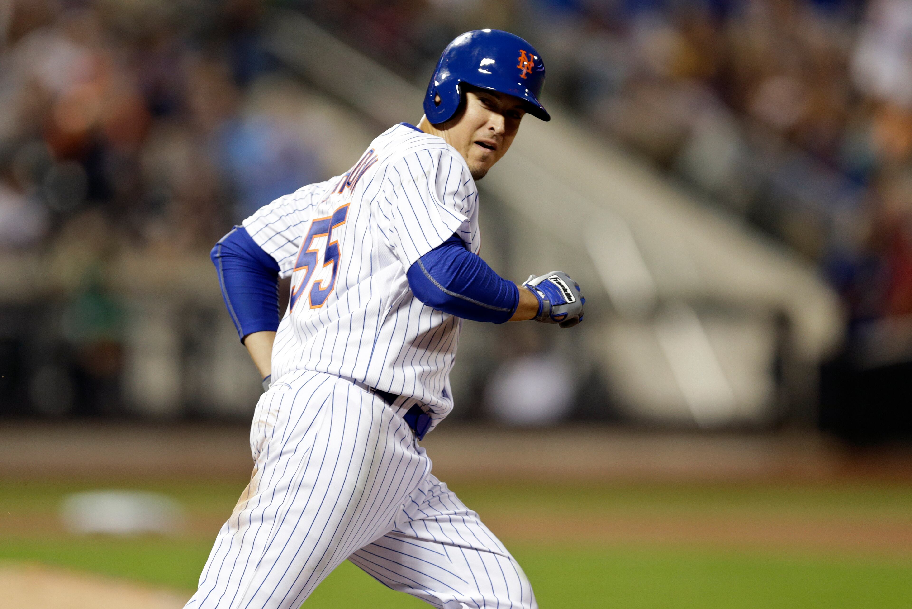 The Braves traded Kelly Johnson and Juan Uribe to the Mets Friday and the veteran players have already helped New York win twice. Uribe smashed a game-winning single in the 10th inning Sunday in the Mets' 3-2 victory over the Dodgers. Johnson (above) had two hits, one of them a home run, in a 15-2 win over the Dodgers on Saturday. Take a look at photos of Johnson and Uribe playing for their new team. (AP Photo/Frank Franklin II)