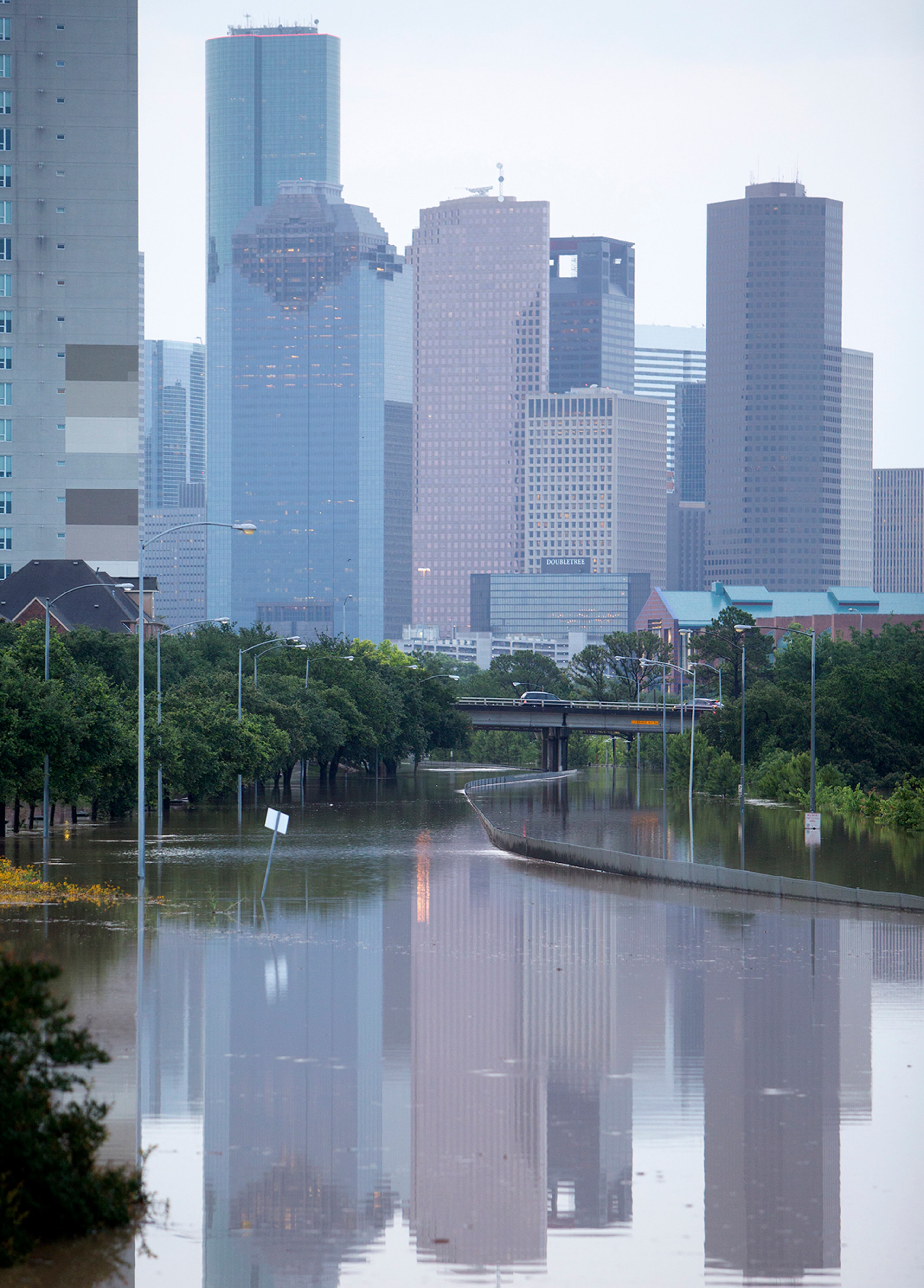 Memorial Drive in Houston is flooded after storms flooded the area, Tuesday, May 26, 2015. Overnight heavy rains caused flooding closing some portions of major highways in the Houston area. (Cody Duty/Houston Chronicle via AP)