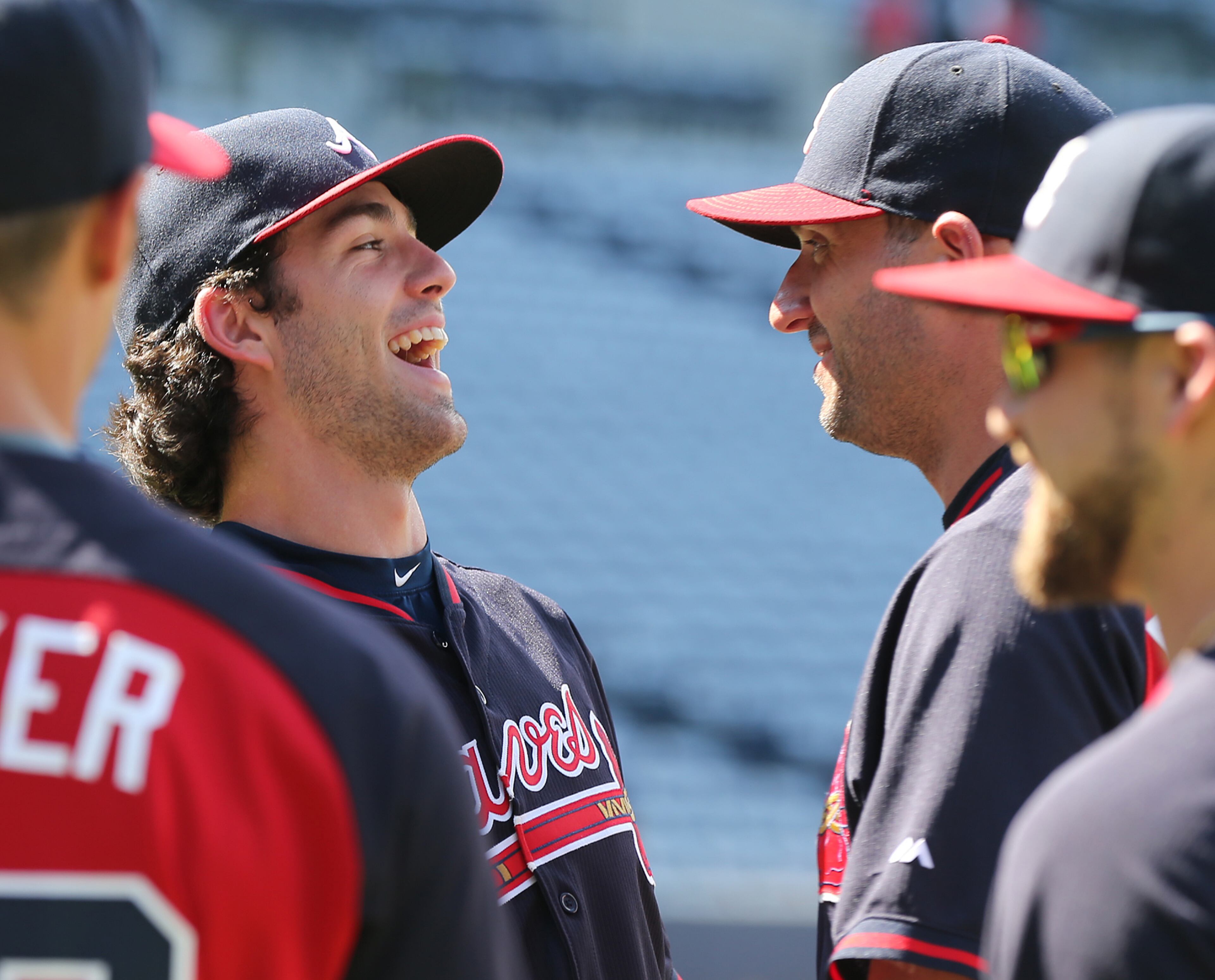 081716 ATLANTA: Braves top prospect Dansby Swanson (left) shares a laugh with Jeff Francoeur and his other teammates as he takes the field to make his MLB debut at Turner Field during batting practice before playing the Twins in a baseball game on Wednesday, August 17, 2016, in Atlanta. Curtis Compton /ccompton@ajc.com