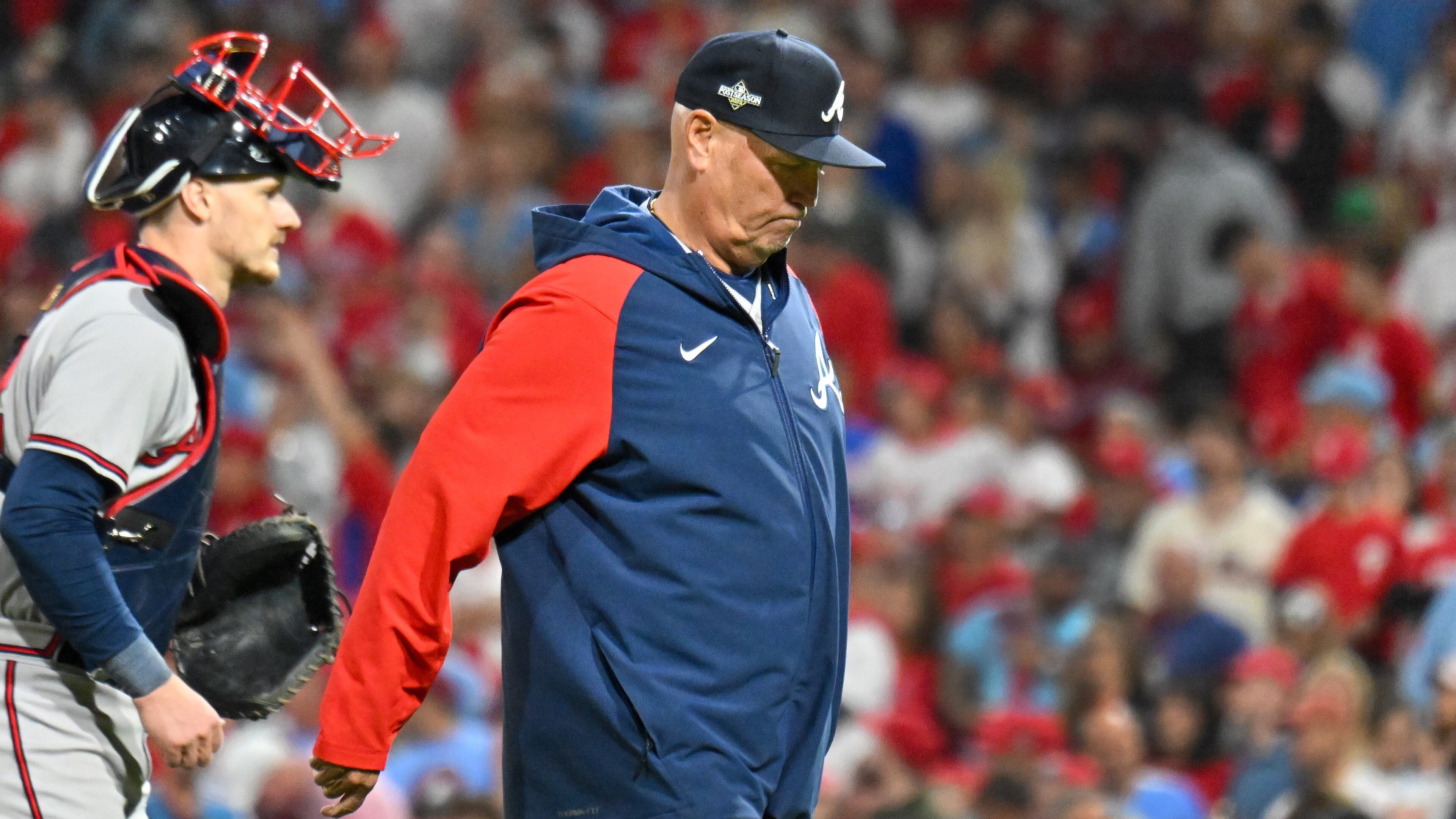Atlanta Braves manager Brian Snitker exits the field after a pitching change during the eighth inning of NLDS Game 4 against the Philadelphia Phillies at Citizens Bank Park in Philadelphia on Thursday, Oct. 12, 2023. (Hyosub Shin / Hyosub.Shin@ajc.com)