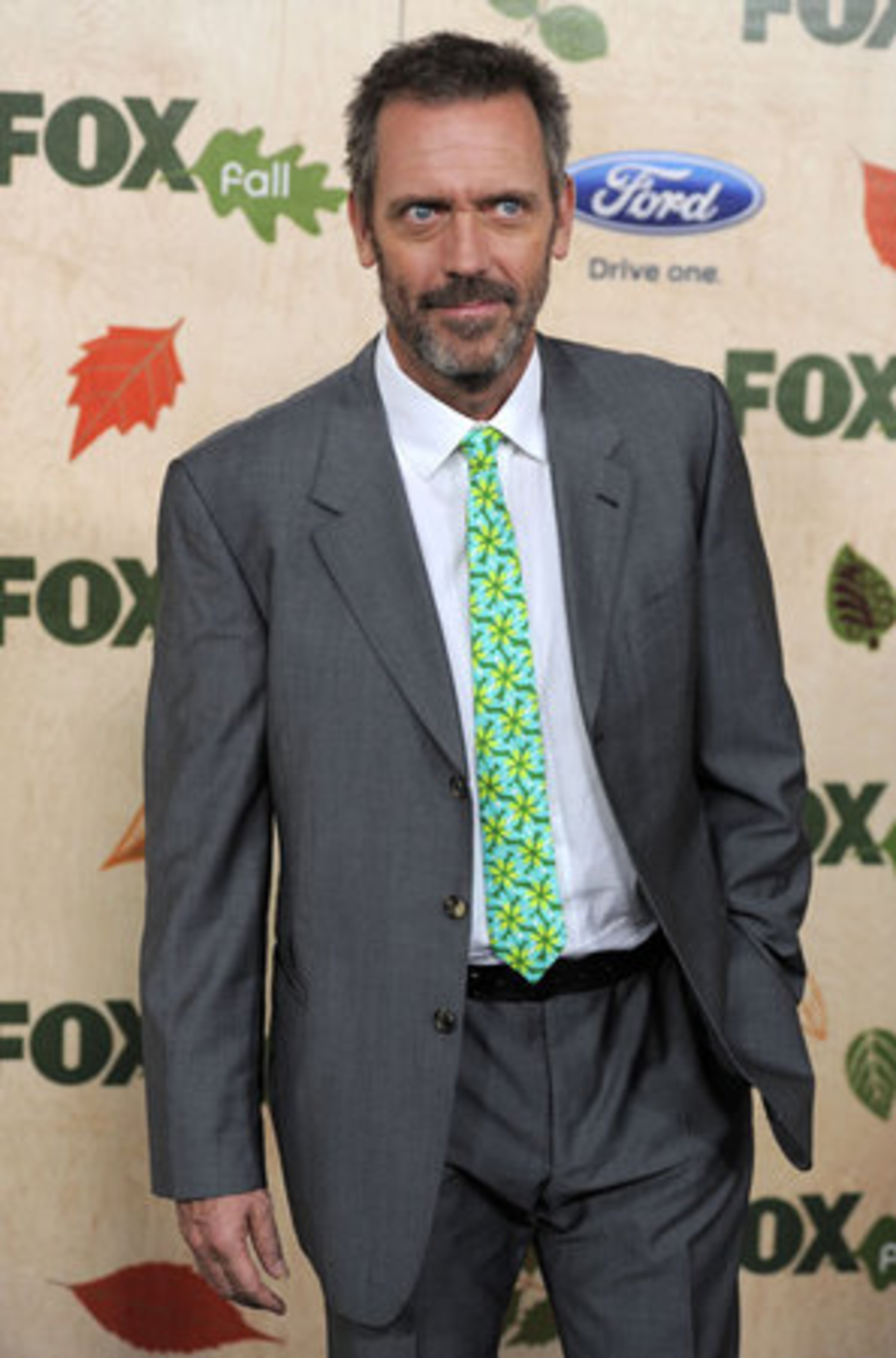 Hugh Laurie, of "House," arrives at the event.