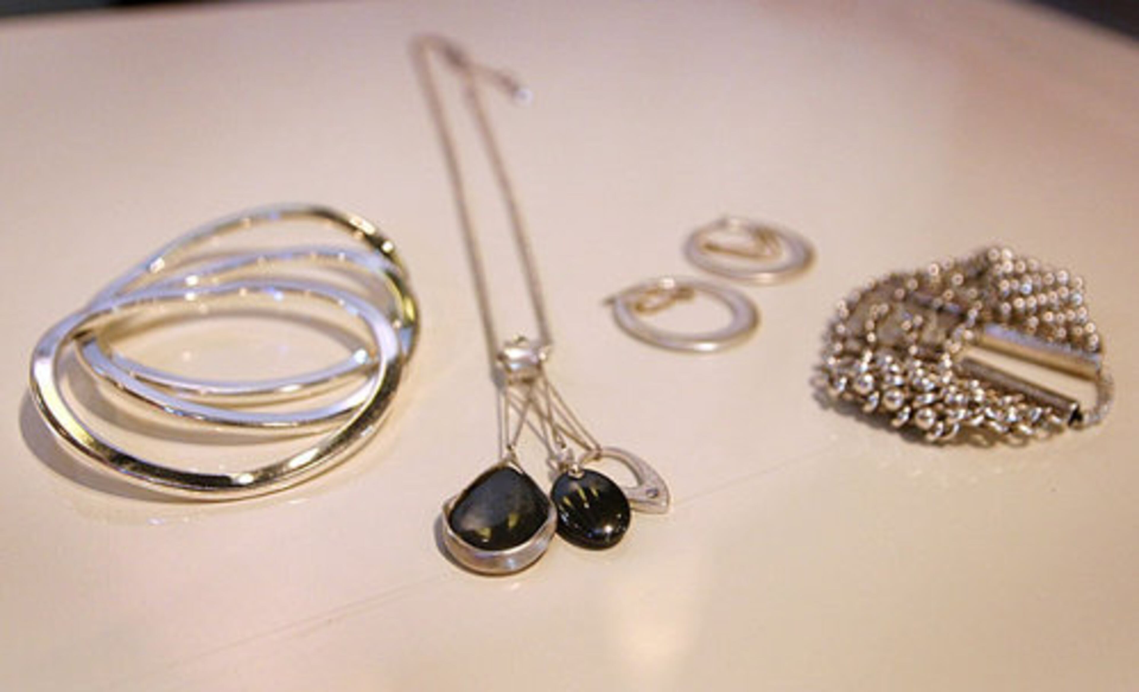 BEST FIND: "So many!" Hitting the sale rack at Bloomingdale's or Buckhead boutiques like Addiction are a way to start." Pictured is Blanco's jewelry by Kenneth Cole.