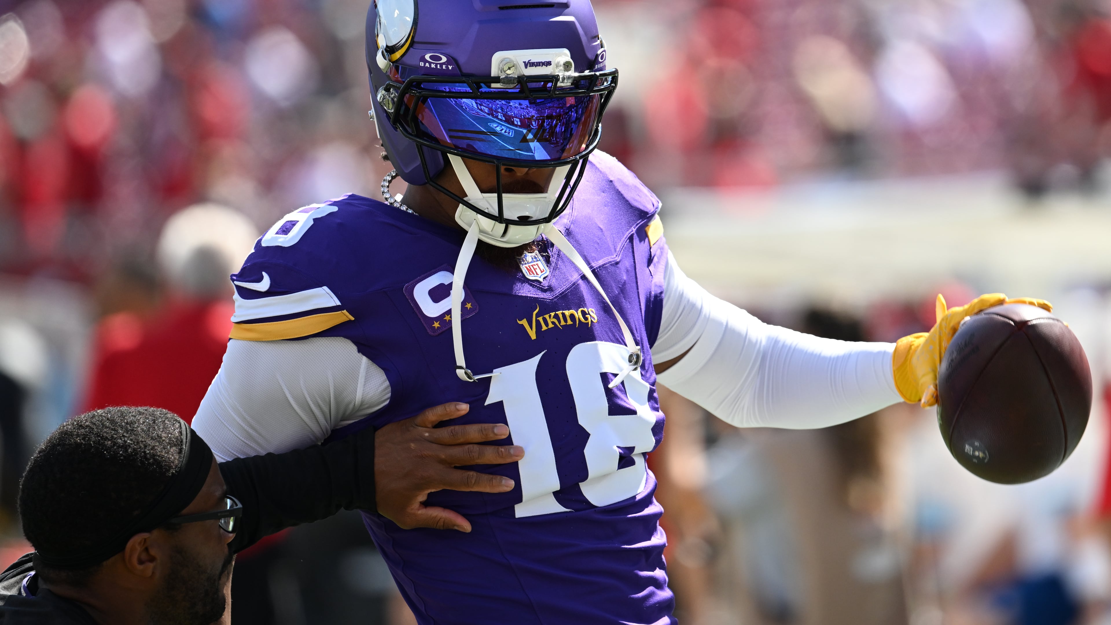 Minnesota Vikings wide receiver Justin Jefferson (18) warms up before an NFL football game against the Tampa Bay Buccaneers in Tampa, Fla., Sunday, Sept. 27, 2026. (AP Photo/Jason Behnken)