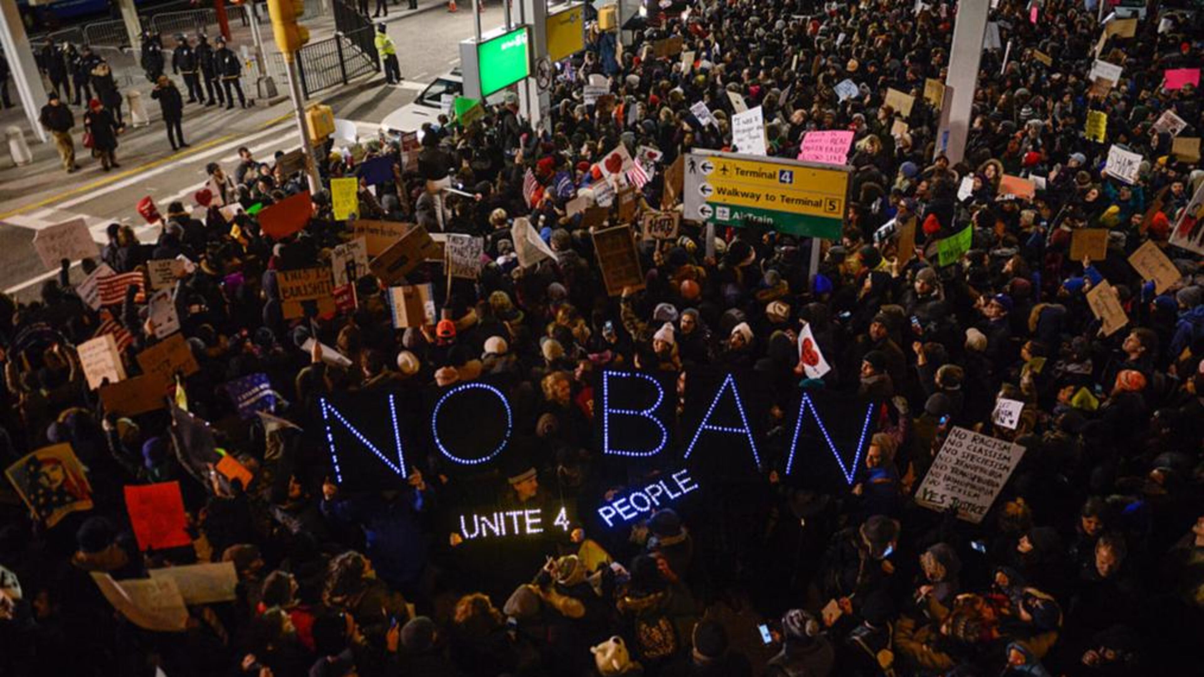 NEW YORK, NY - JANUARY 28: Protestors rally during a demonstration against the Muslim immigration ban at John F. Kennedy International Airport on January 28, 2017 in New York City. President Trump signed the controversial executive order that halted refugees and residents from predominantly Muslim countries from entering the United States. (Photo by Stephanie Keith/Getty Images)