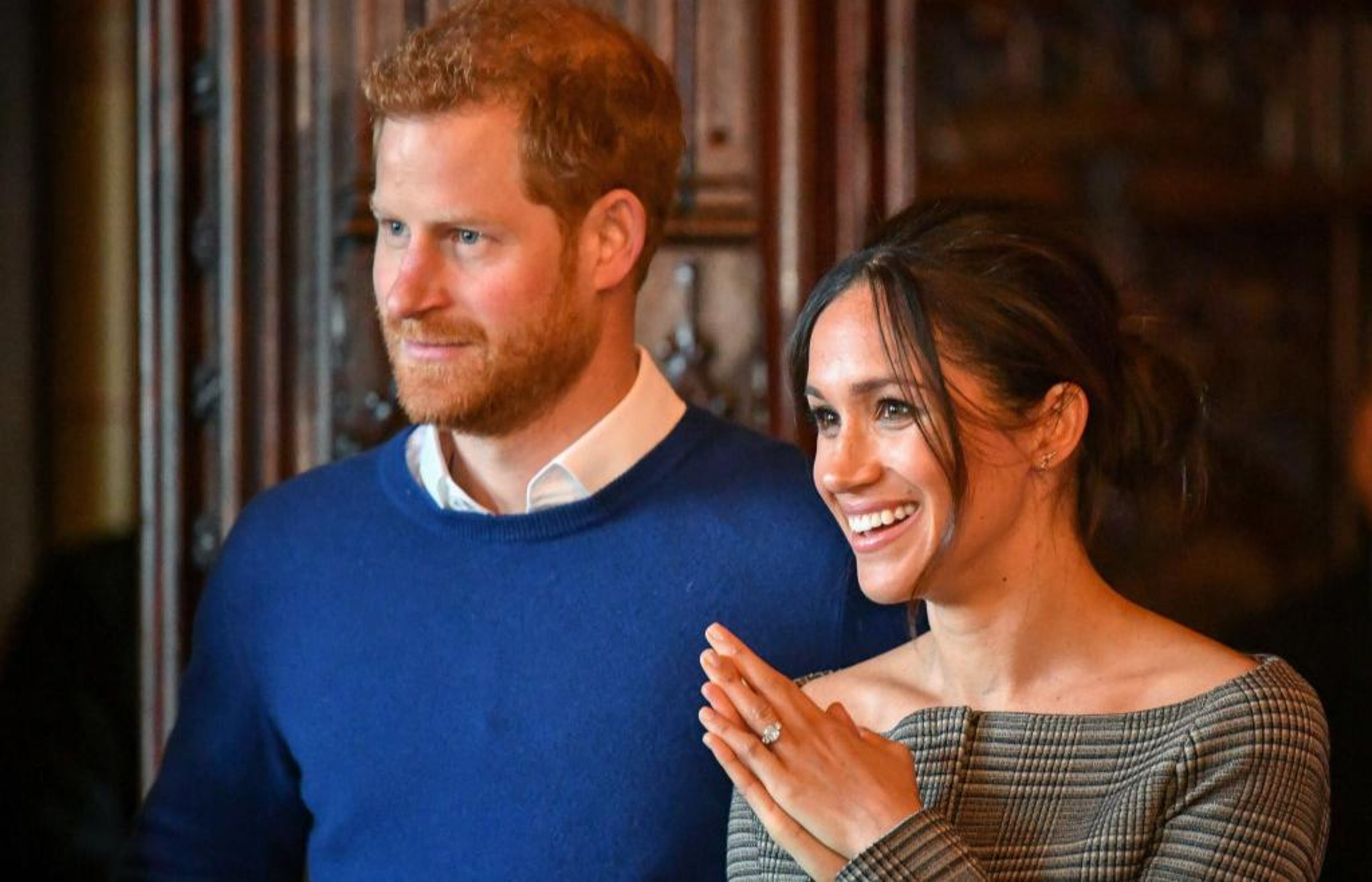 Prince Harry and Meghan Markle watch a performance by a Welsh choir in the banqueting hall during a visit to Cardiff Castle on January 18, 2018 in Cardiff, Wales.