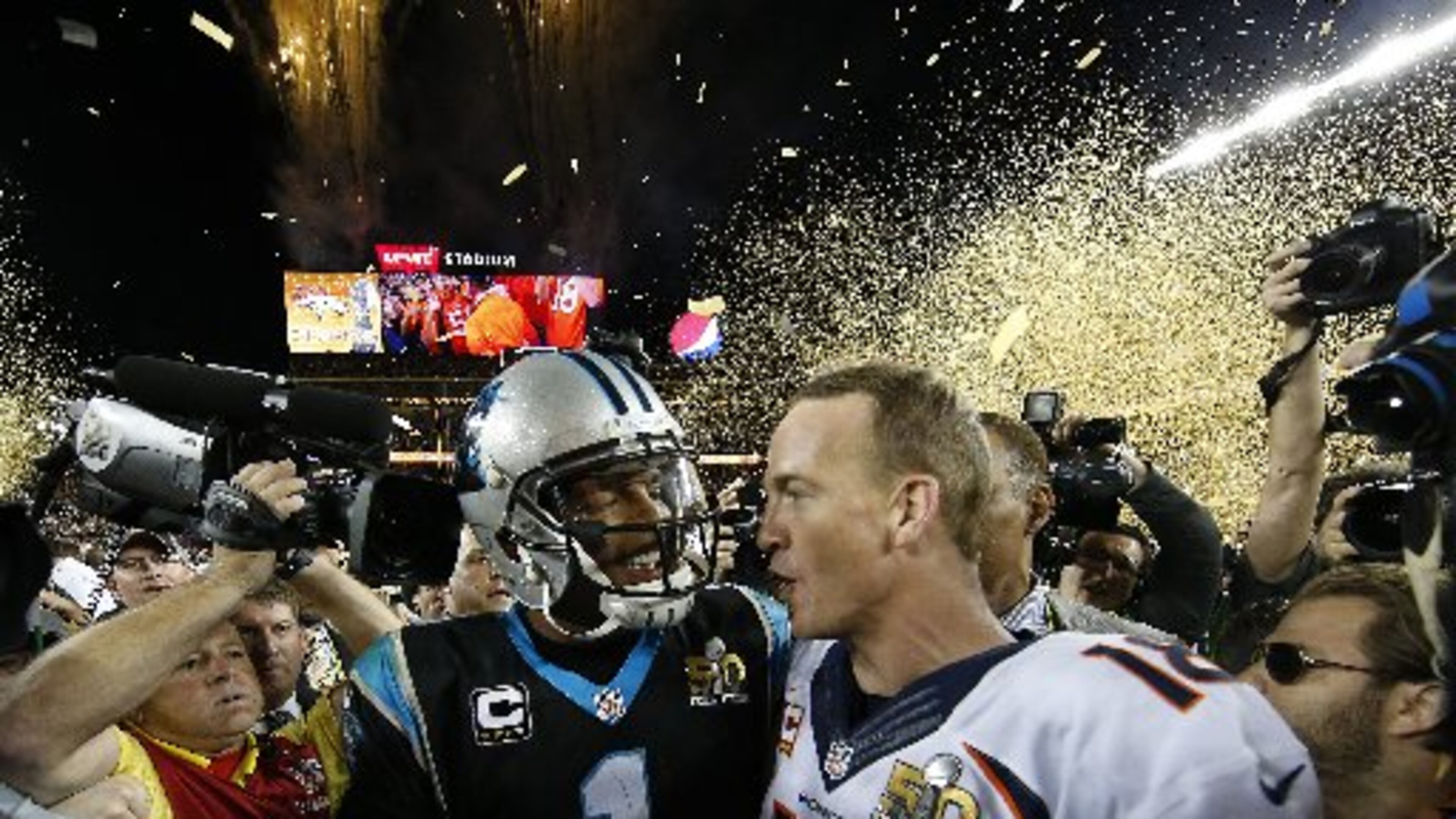 Cam Newton congratulated Peyton Manning on winning Super Bowl 50 before dissing media. (Ezra Shaw/Getty Images)