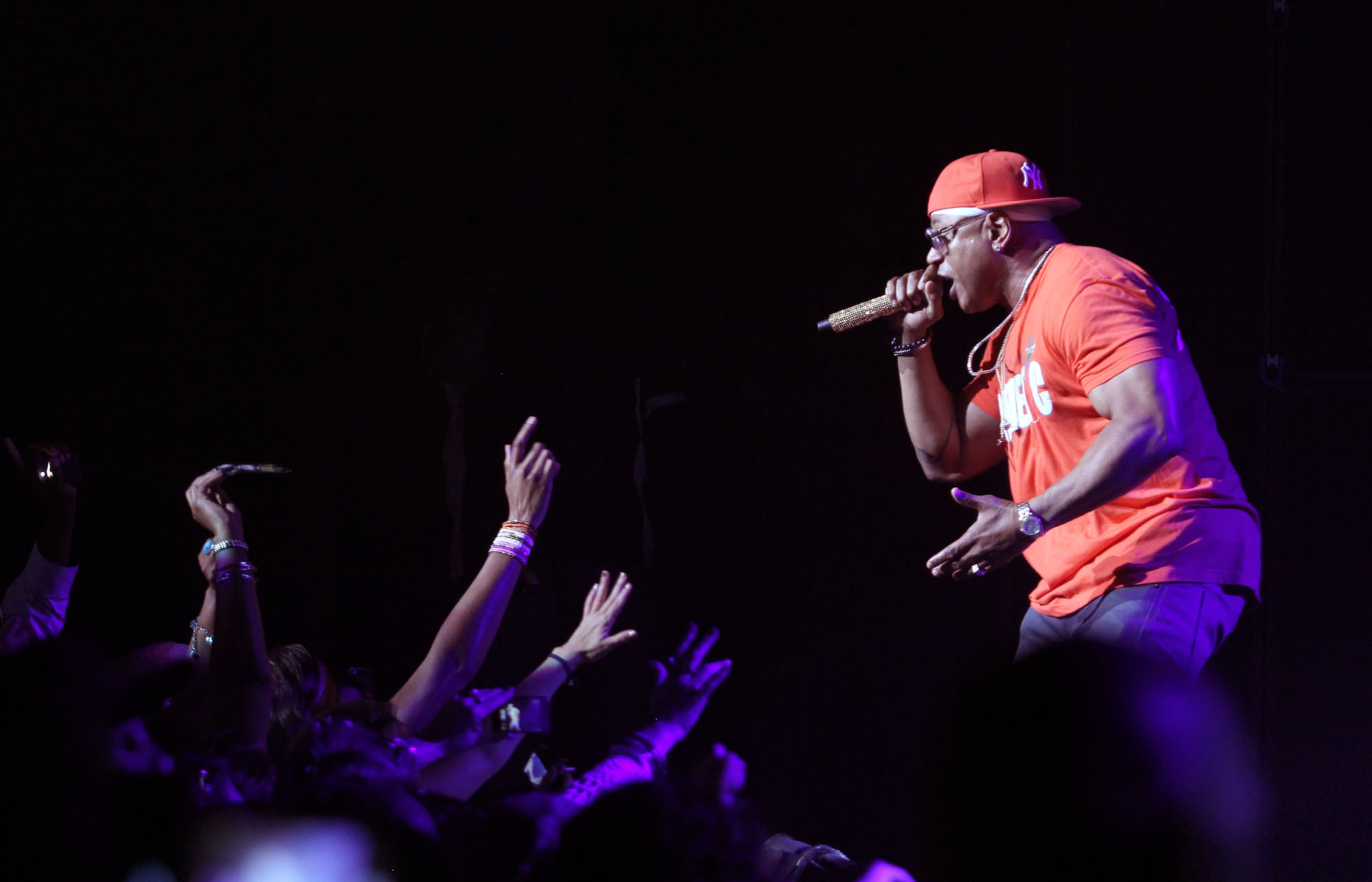 LL Cool J, headliner of the Kings of the MIC Tour, shows he still brings the sexy and draws adoring fans at LL Cool J, considered the "father of the hip-hop heartthrobs," headlines the Kings of the MIC Tour at Ice Cube performs at the Fox Theatre in Atlanta Tuesday, June 4, 2013.