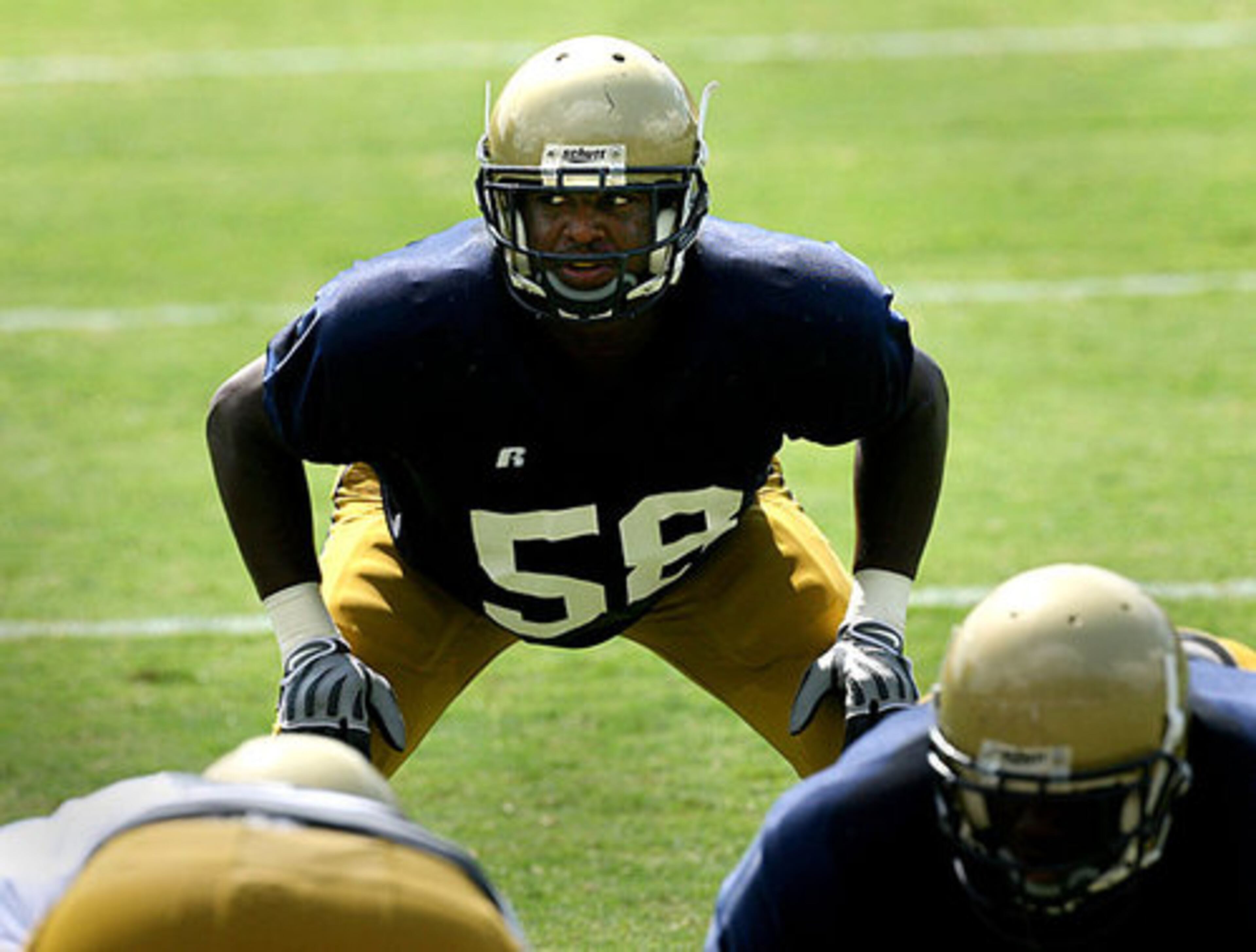Linebacker B.J. Machen keeps his eyes on the running backs.