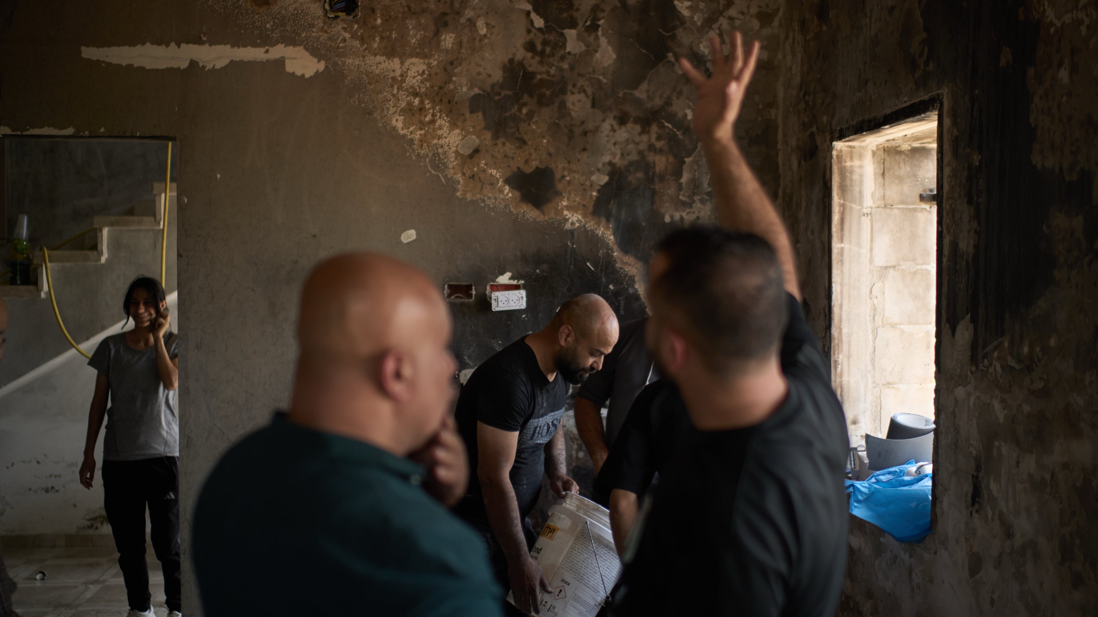 Palestinians gather to repair a damaged house following an attack by Israeli settlers the previous day in the village of Sarra, near the West Bank city of Nablus, Saturday, July 25, 2026. (AP Photo/Leo Correa)