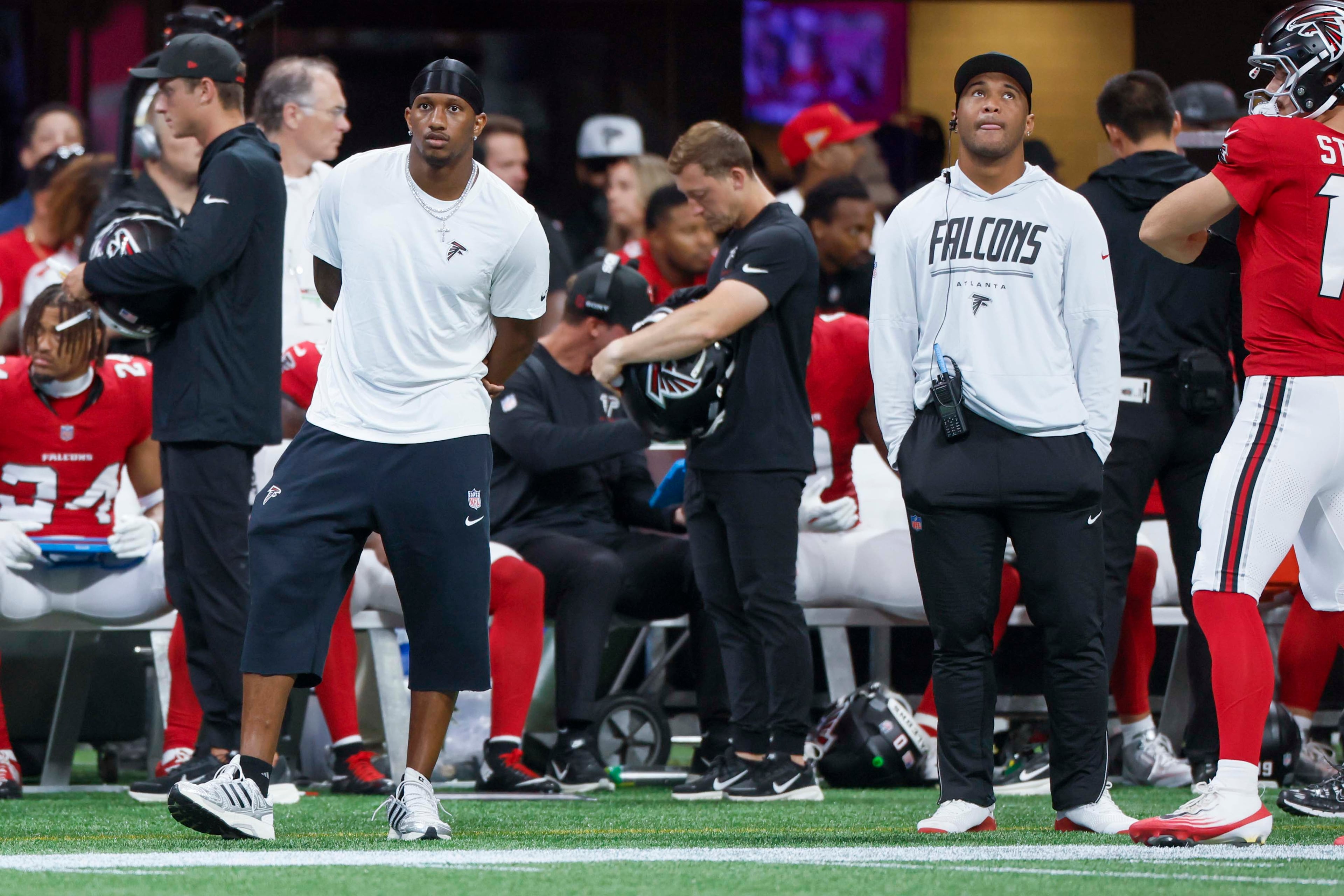 Atlanta Falcons quarterbacks Michael Penix Jr. (9), Tua Tagovailoa (1) watches the game from the side lines during the first half of an NFL football game against the Carolina Panthers at Mercedes-Benz Stadium in Atlanta on Sunday, September 20, 2026.
(Miguel Martinez/AJC)