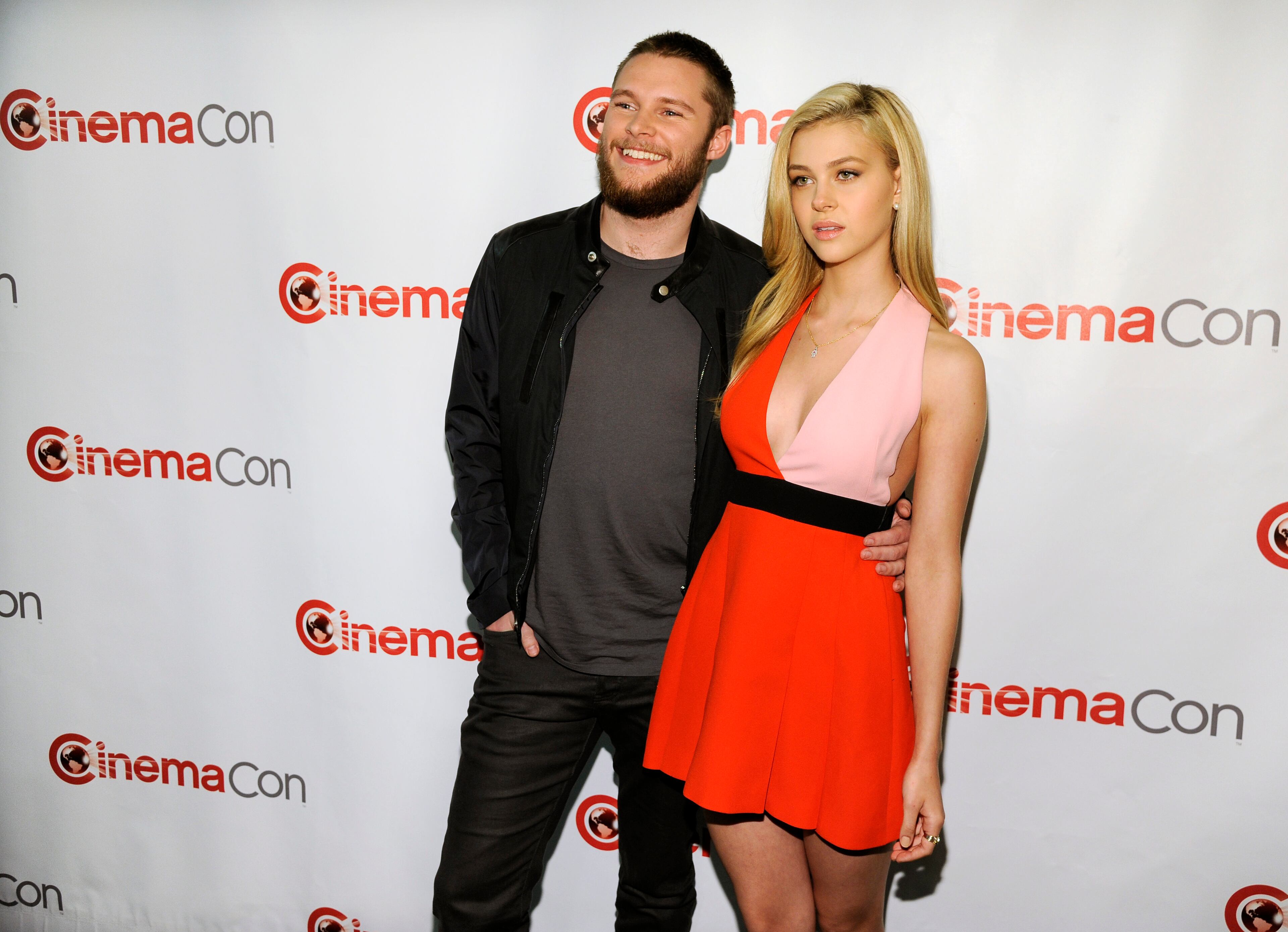 Jack Reynor, left, and Nicola Peltz, cast members in the upcoming film "Transformers: Age of Extinction," pose together at the Opening Night Presentation from Paramount Pictures at CinemaCon 2014 on Monday, March 24, 2014 in Las Vegas. (Photo by Chris Pizzello/Invision/AP)