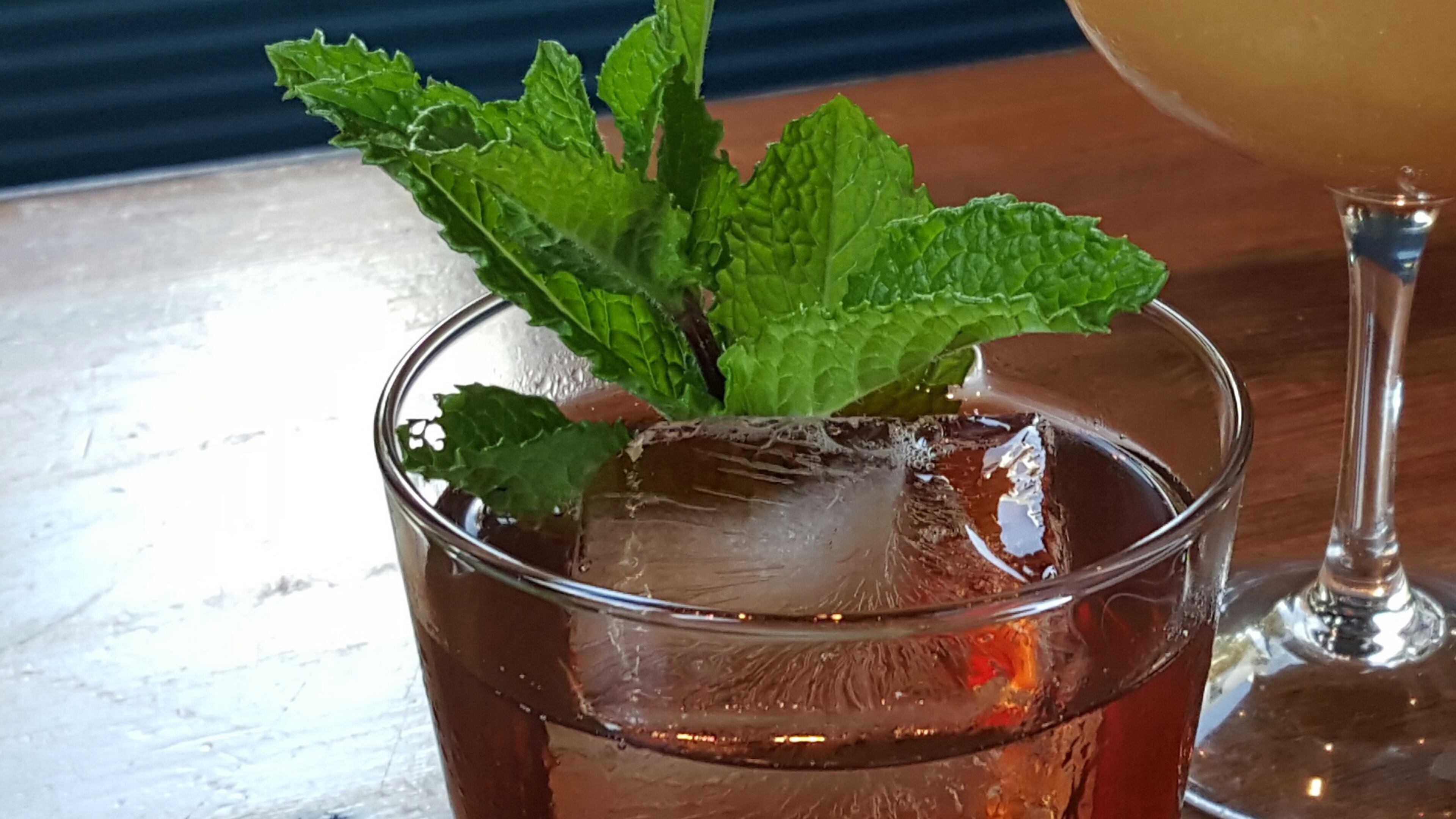 Empire State South is a popular cocktail destination for Atlanta's beverage industry. Pictured is the cognac- and rye-based Two World Hero. Photo by Jonathan Aherin.