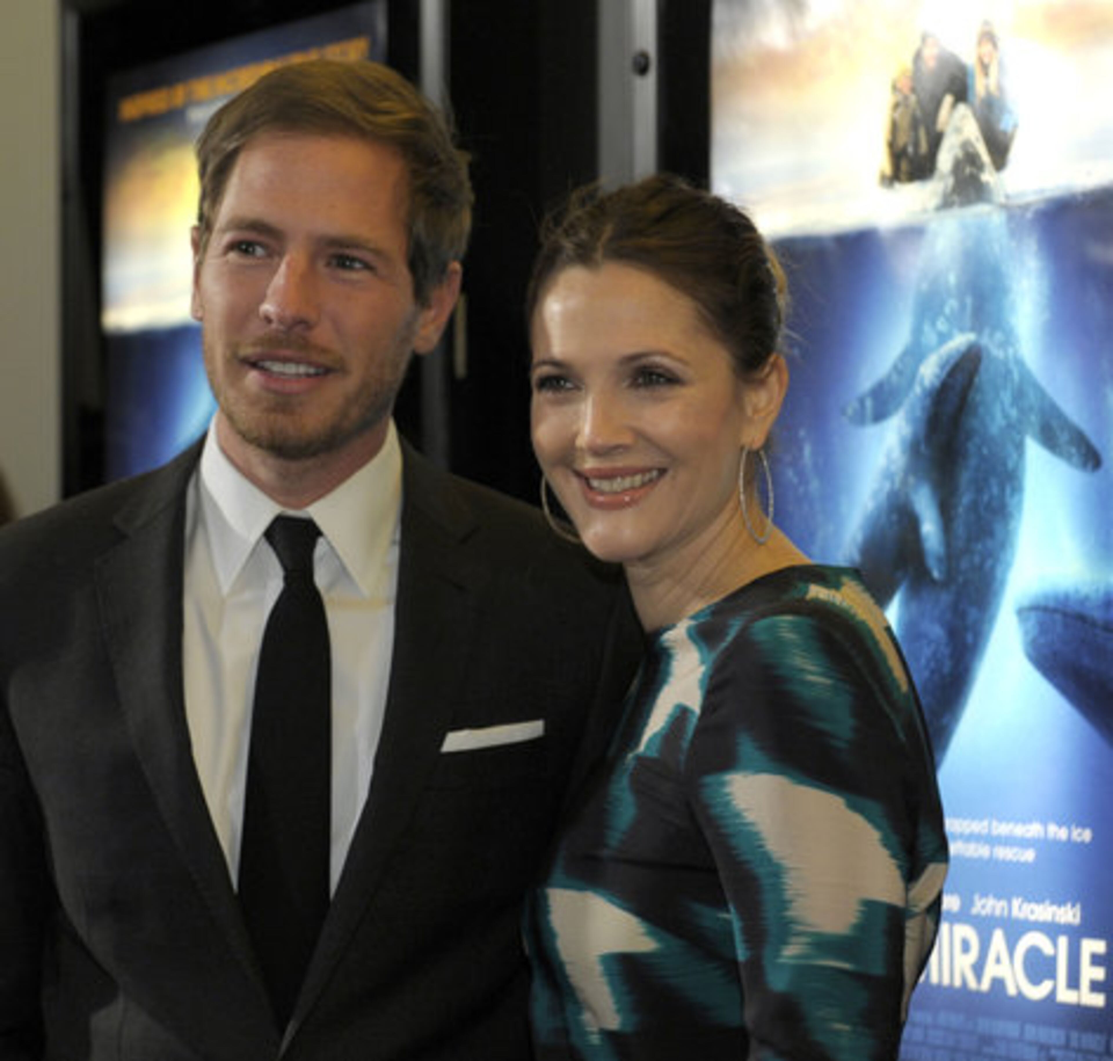 Actress Drew Barrymore and her fiance Will Kopelman arrive for the premiere of "Big Miracle" in Washington, Wednesday, Jan. 25, 2012. "Big Miracle" is a film based on a true story chronicling the Reagan administration's 1988 partnership with the Soviet Union, environmentalists and oil companies to free whales -- a costly and ultimately successful effort that drew international attention.