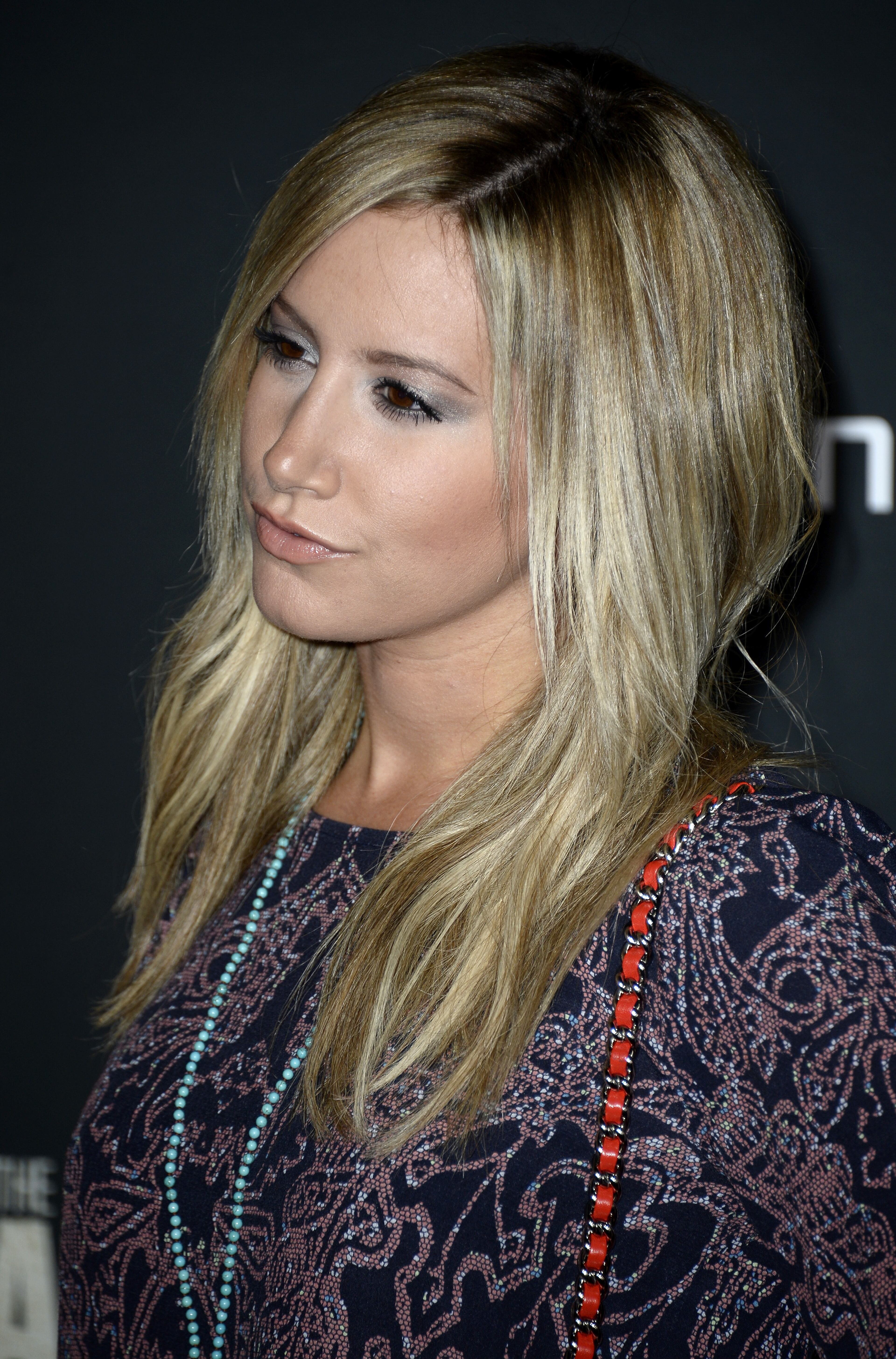 Actress Ashley Tisdale arrives at the premiere of AMC's "The Walking Dead" 4th season at Universal CityWalk on October 3, 2013 in Universal City, California.
