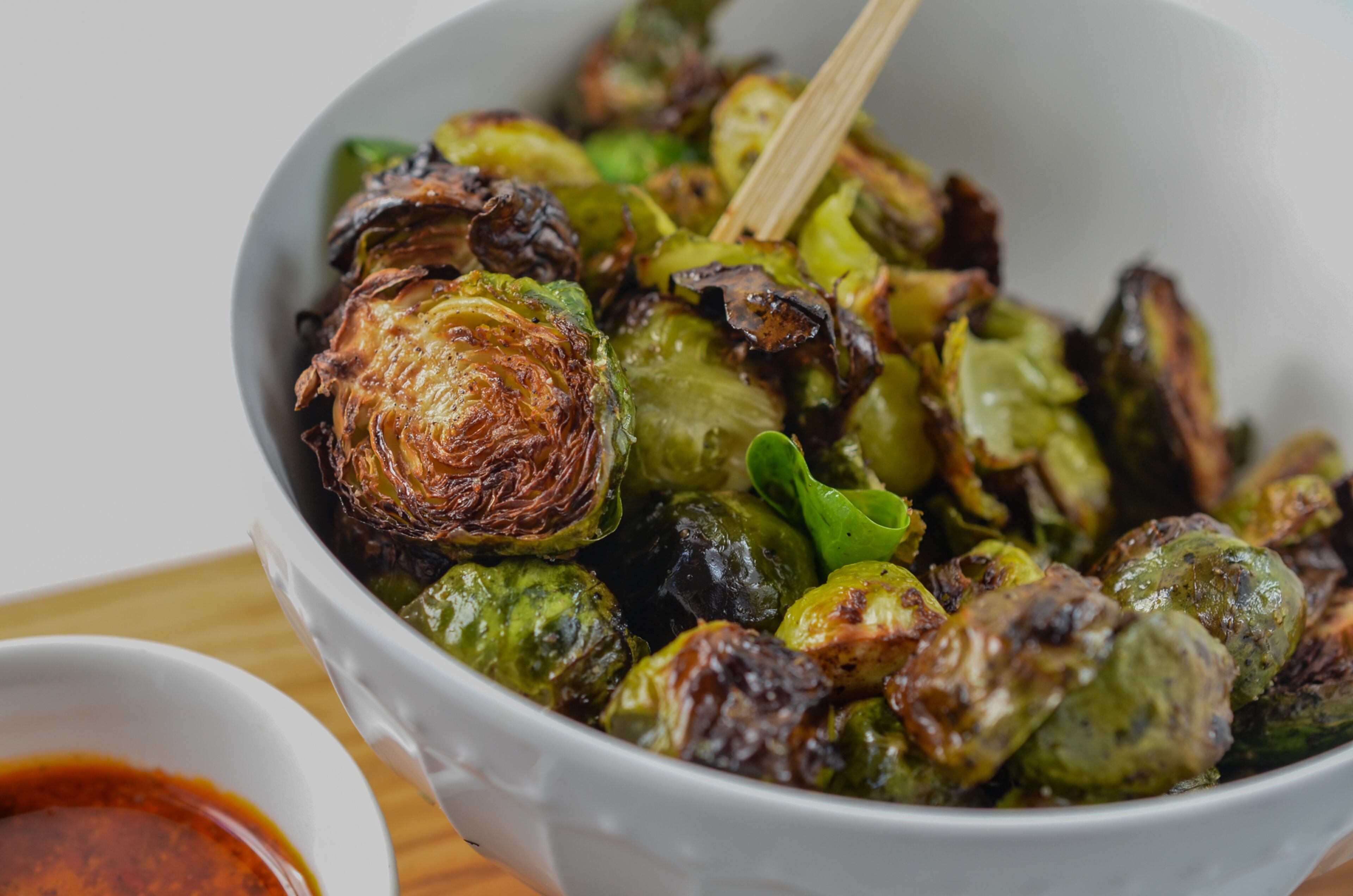 Roasted Brussels sprouts are not only a side dish for supper but also a healthy afternoon snack. (Virginia Willis for The Atlanta Journal-Constitution)