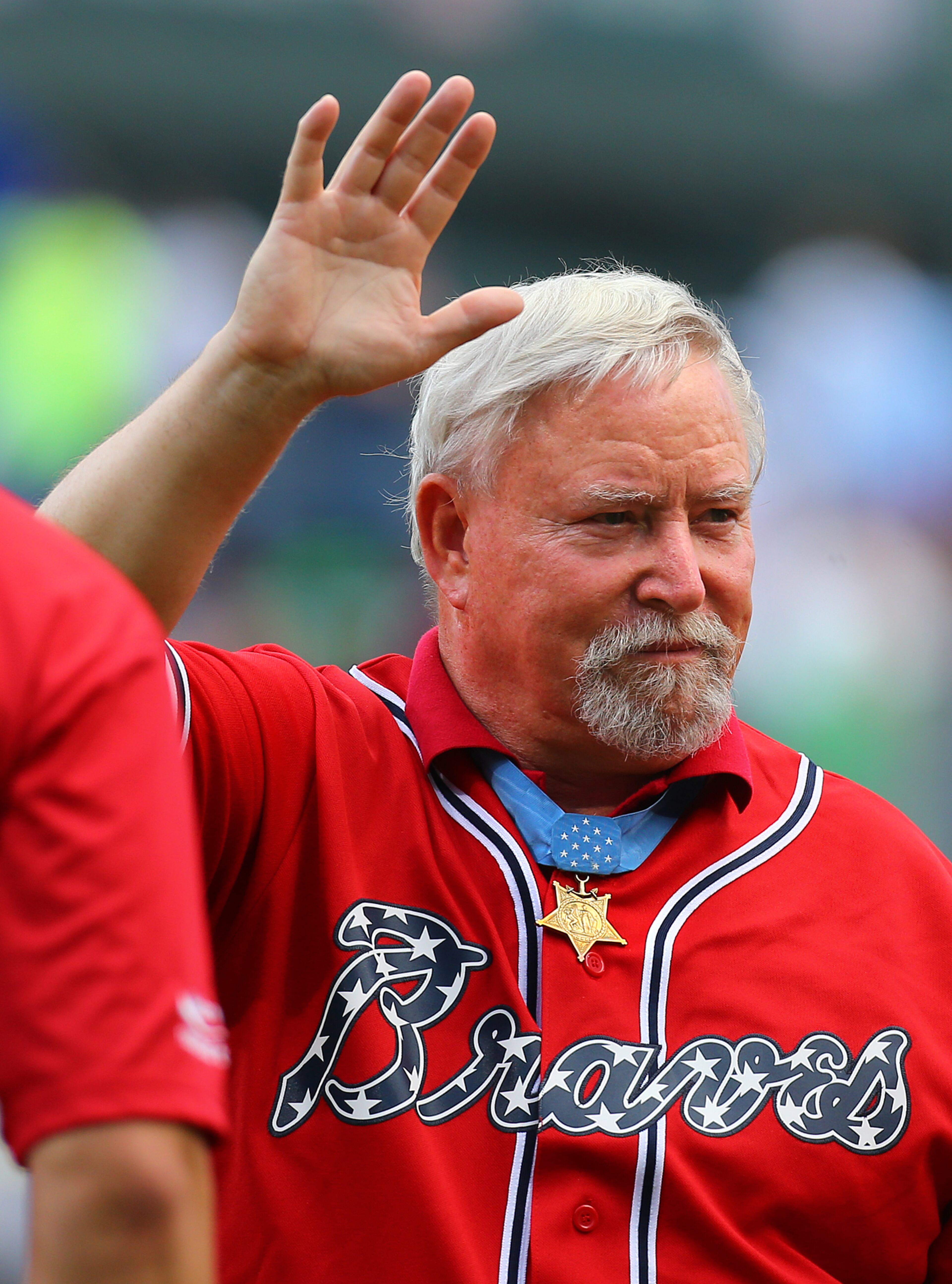 The Braves honor Congressional Medal of Honor recipient Colonel Donald Ballard, who served as a corpsman in the Navy during the Vietnam War, during a pregame ceremony on Tuesday, June 3, 2014, in Atlanta. According to his citation, he threw himself on a grenade to protect his comrades, and when it failed to detonate immediately, he tossed it back at the enemy. CURTIS COMPTON / CCOMPTON@AJC.COM