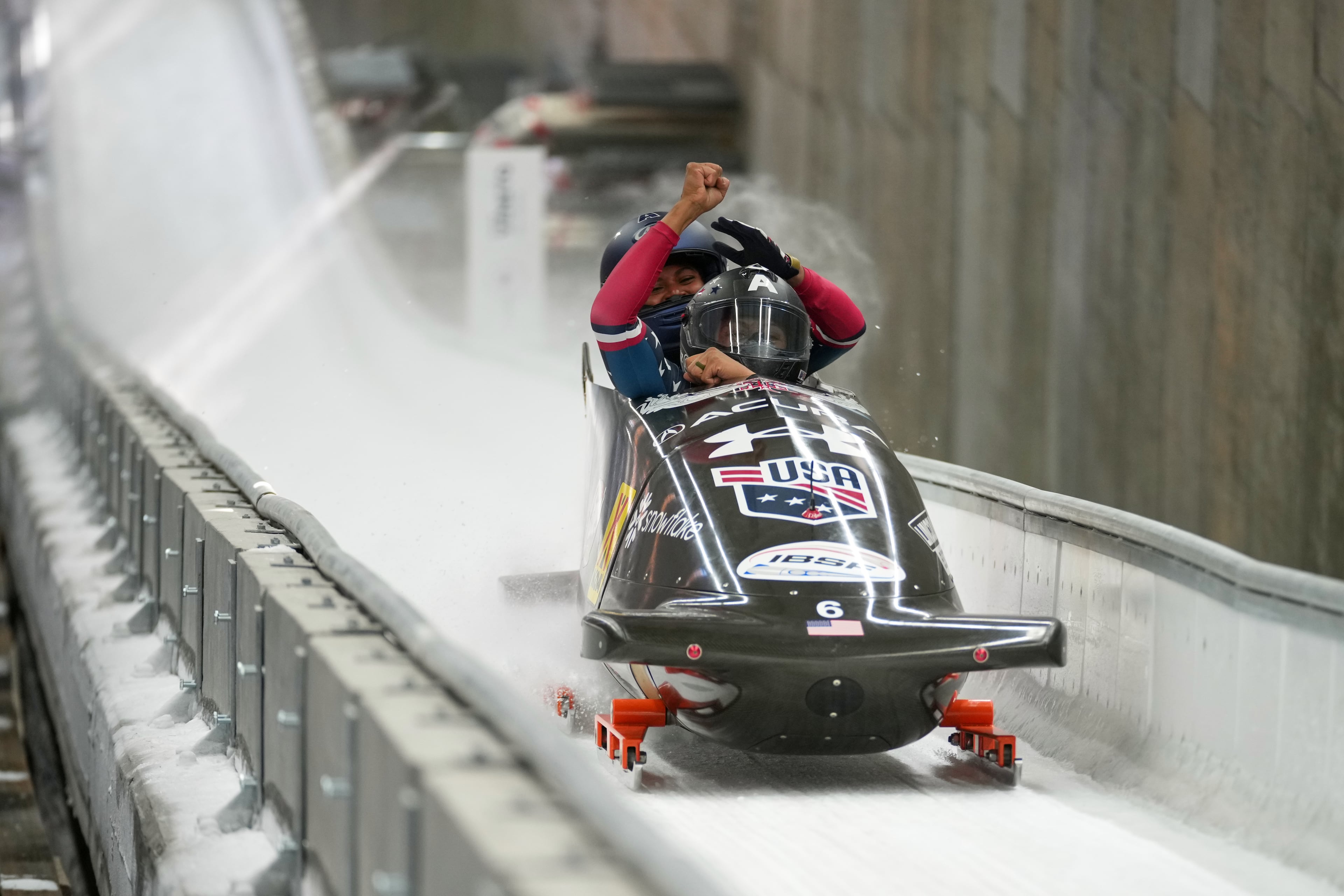 Elana Meyers Taylor and Jasmine Jones of the U.S. finish their second run during the two-woman bobsled during an Olympic test event in Cortina D'Ampezzo, Italy, on Nov. 23. (Andrew Medichini/AP)