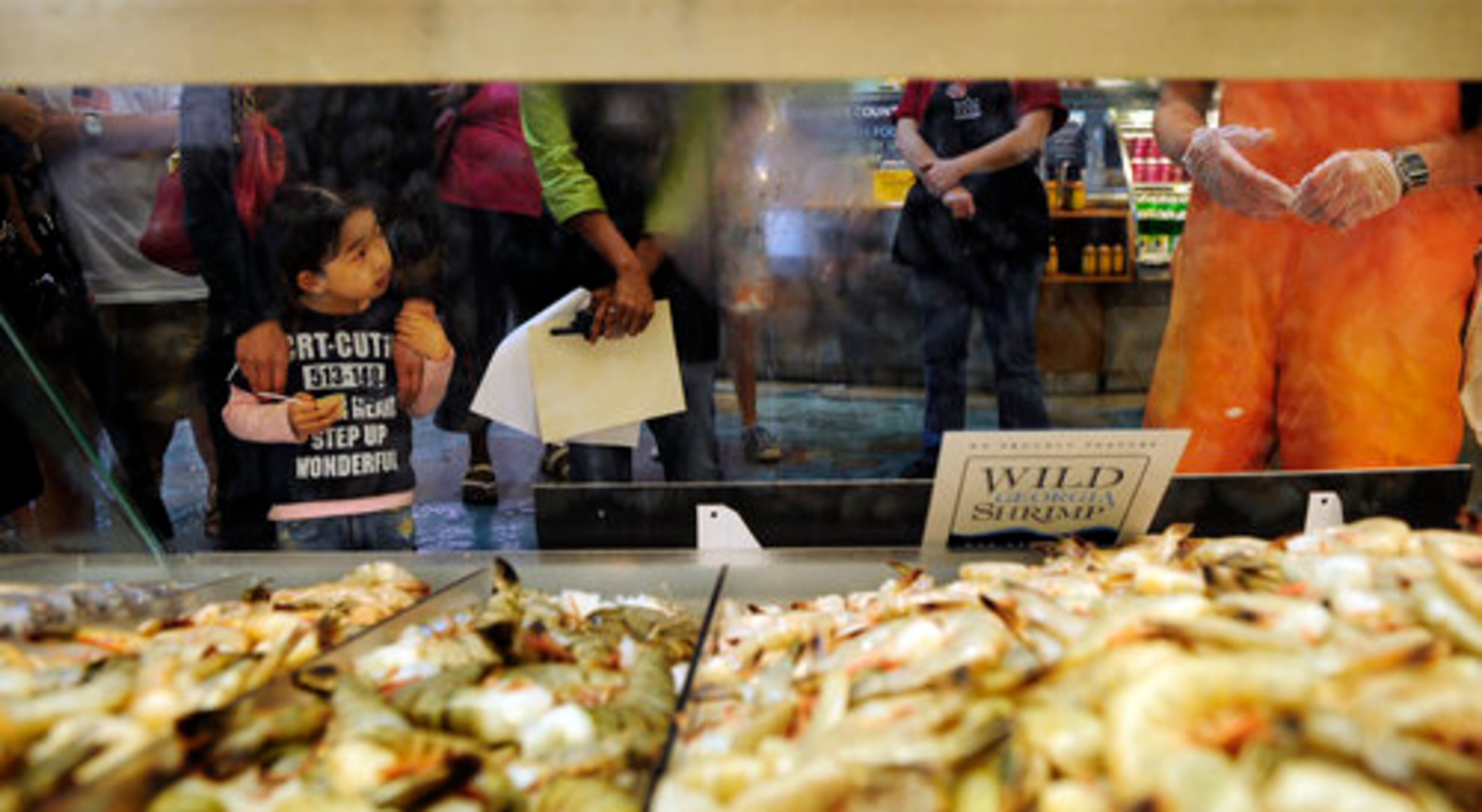 Customer Don Taylor of Duluth, who eats at one of the store's restaurants every day with his wife, Carol, adds another tip: You'll pay extra for convenience foods. He points to the unhusked ears of Florida yellow corn, four for $2. They're a much better deal than husked, packaged ears, five for $4.99. Here, customers look for bargains in the seafood department. Whole Foods is trying to put more perishable items on sale, says spokeswoman Darrah Horgan.
