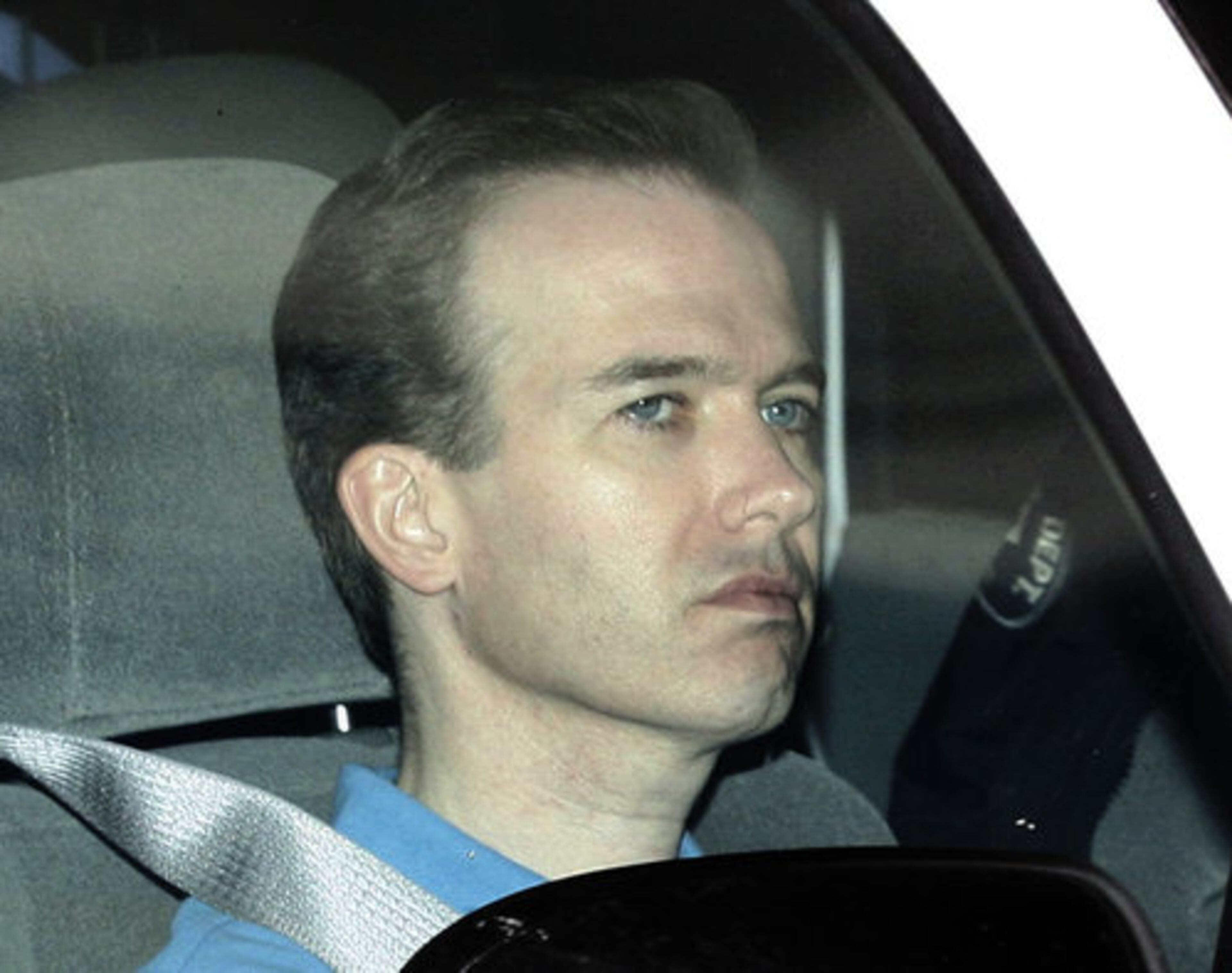John Mark Karr rides in a police vehicle as he arrives back at the Boulder County Jail in Boulder, Colo., on Aug. 28, 2006. Prosecutors decided not to charge Jim in the slaying of JonBenet Ramsey. His DNA failed to match genetic material on the 6-year-old girl's body.