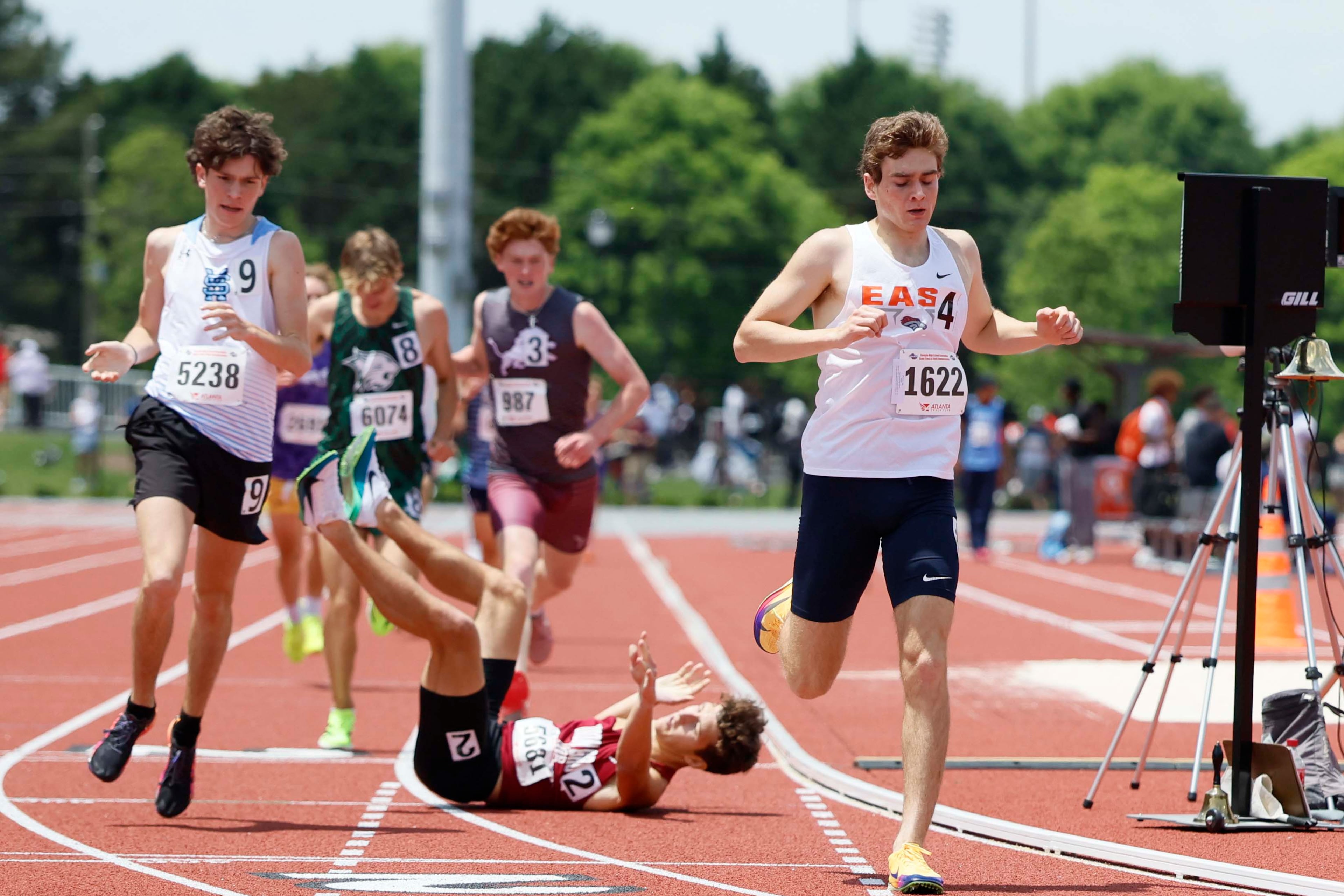 East Forsyth High School’s Josh Wineland crosses the finish line to win the Boys 1600-meter Run AAAA at the GHSA track and field state championships at UGA Spec Towns Track on Monday, May 11, 2026, in Athens.
(Miguel Martinez/AJC)
