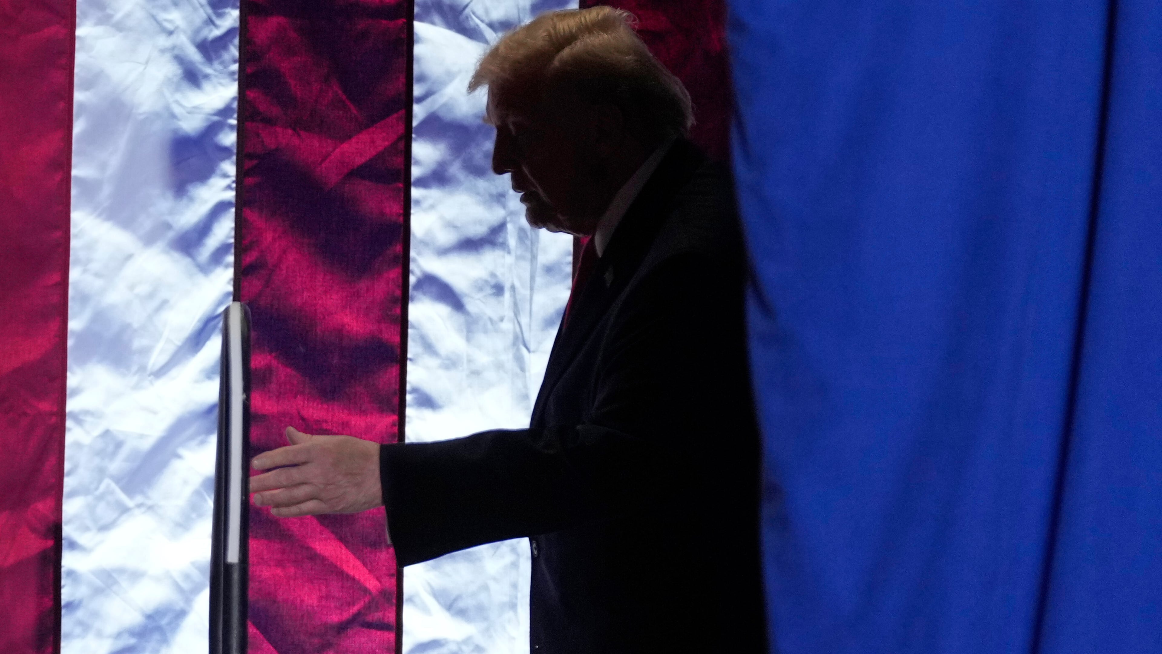 President Donald Trump arrives for an event at the Horizon Events Center in Clive, Iowa, Tuesday, Jan. 27, 2026. (AP Photo/Mark Schiefelbein)