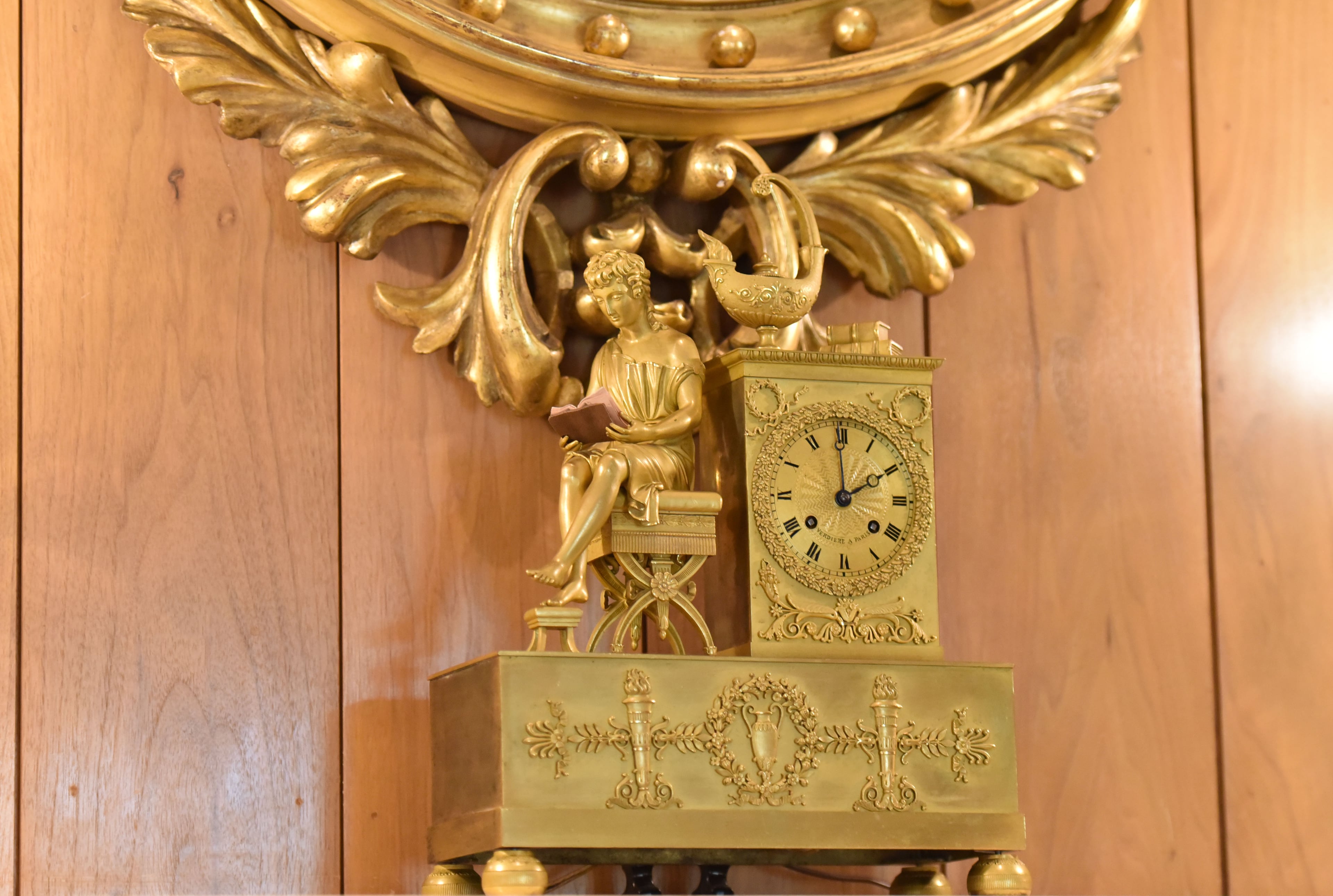 A bronze clock is seen in the family sitting room at the Governor's Mansion on Wednesday, Sept. 9, 2015. HYOSUB SHIN / HSHIN@AJC.COM