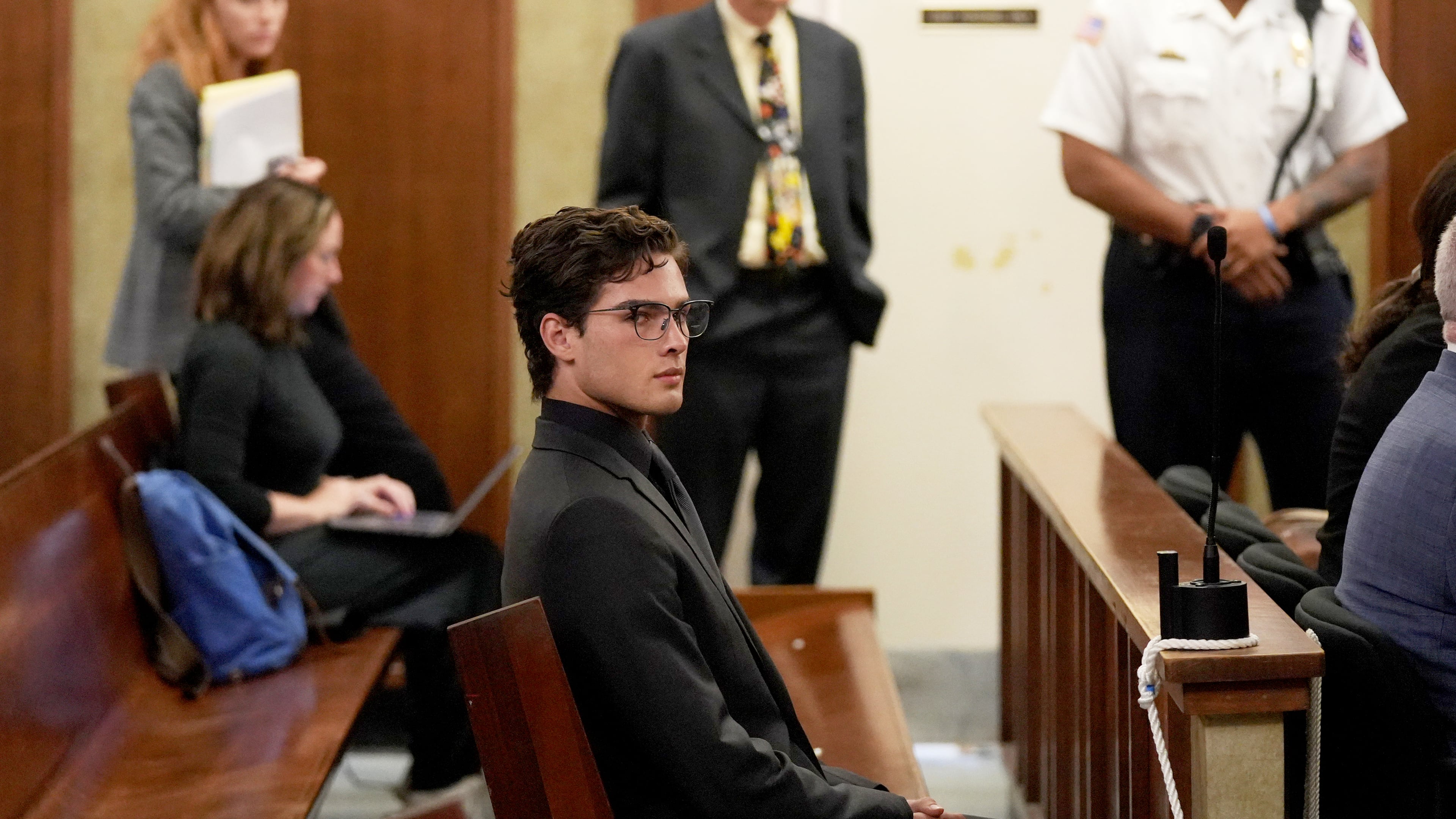 Braden Peters, also known as Clavicular, waits for his arraignment in Orleans District Court, Thursday, Oct. 22, 2026, in Orleans, Mass. (Merrily Cassidy/Cape Cod Times via AP, Pool)