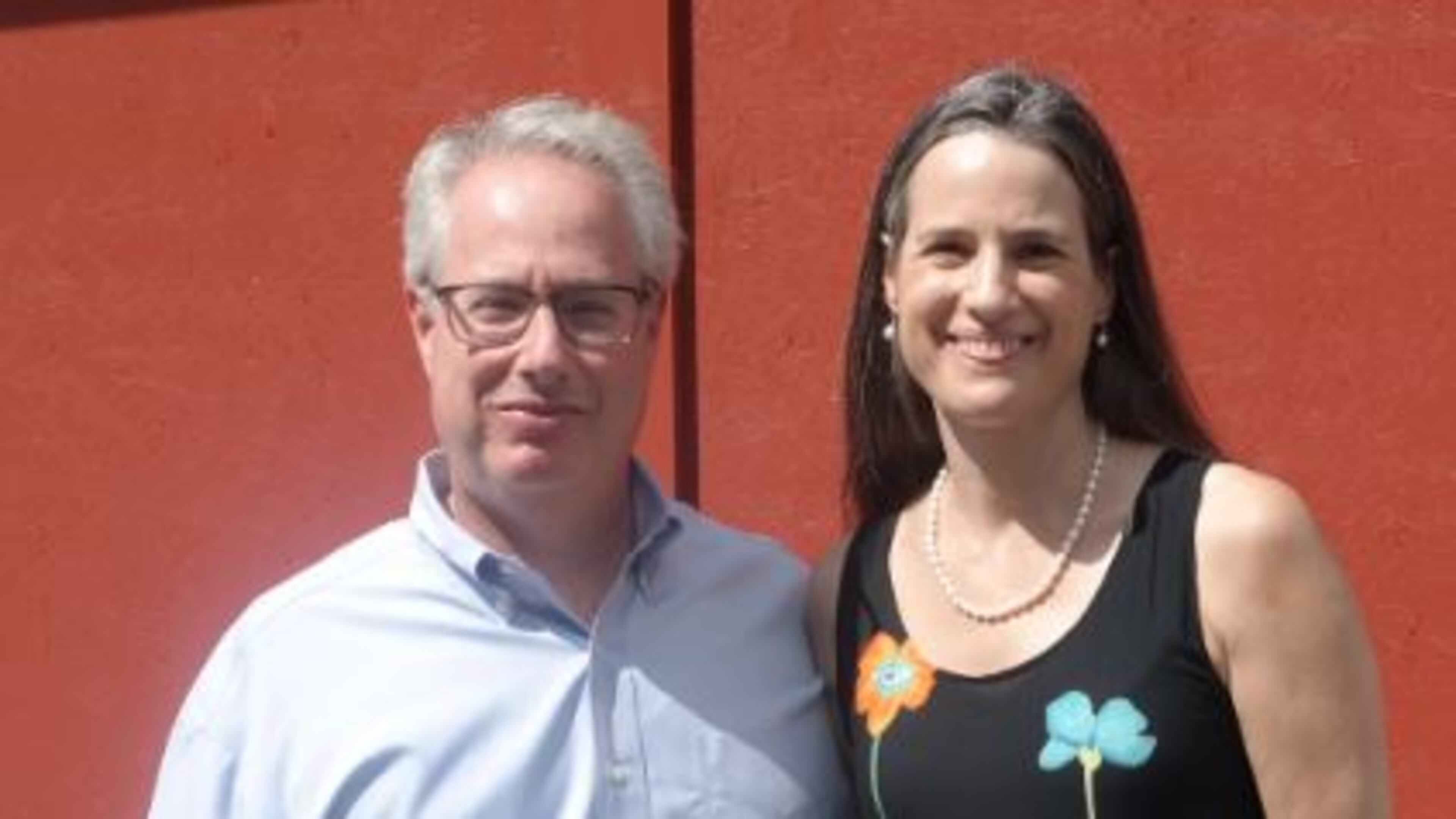 Before she was tossed out of the event, Nydia Tisdale snagged of photo of herself with Attorney General Sam Olens. Photo courtesy of Brian Pritchard, fetchyournews.com