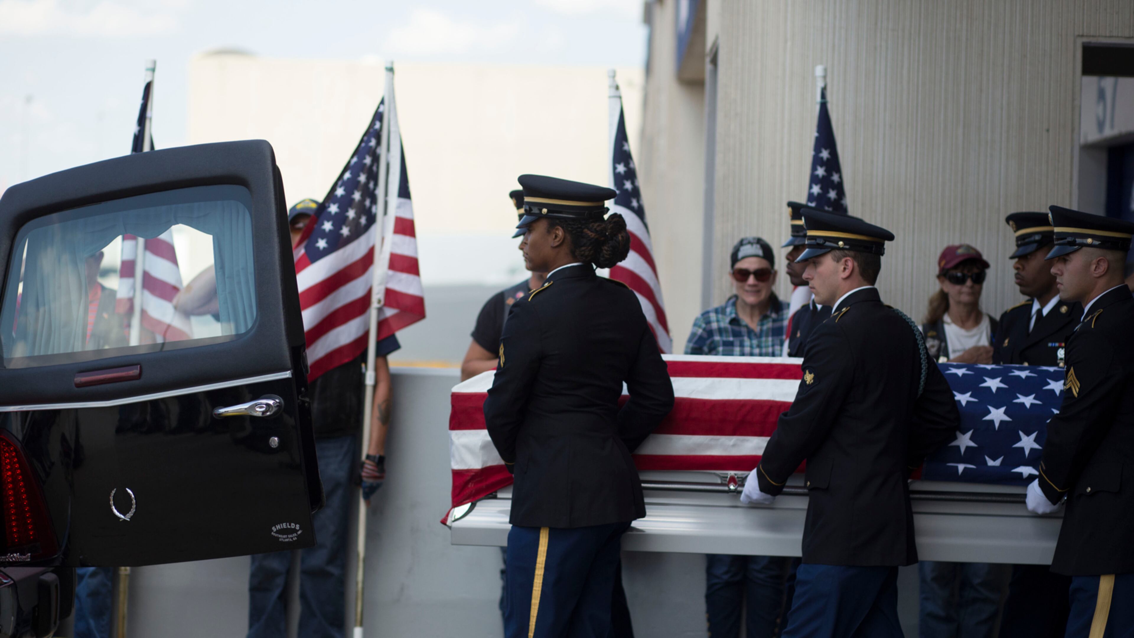 Lieutenant Robert Eugene Oxford, age 24, of Concord, Ga. died Jan. 25, 1944, when his U.S. Army plane crashed during a cargo flight over the Himalayan Mountains. His remains were returned to the United States for identification last year. His remains returned home Thursday, June 8, 2017. Members of the military carry Oxford's casket into the hearse at Hartsfield-Jackson International Airport. The remains of seven other crew members have not been found. Chad Rhym/ chad.rhym@ajc.com