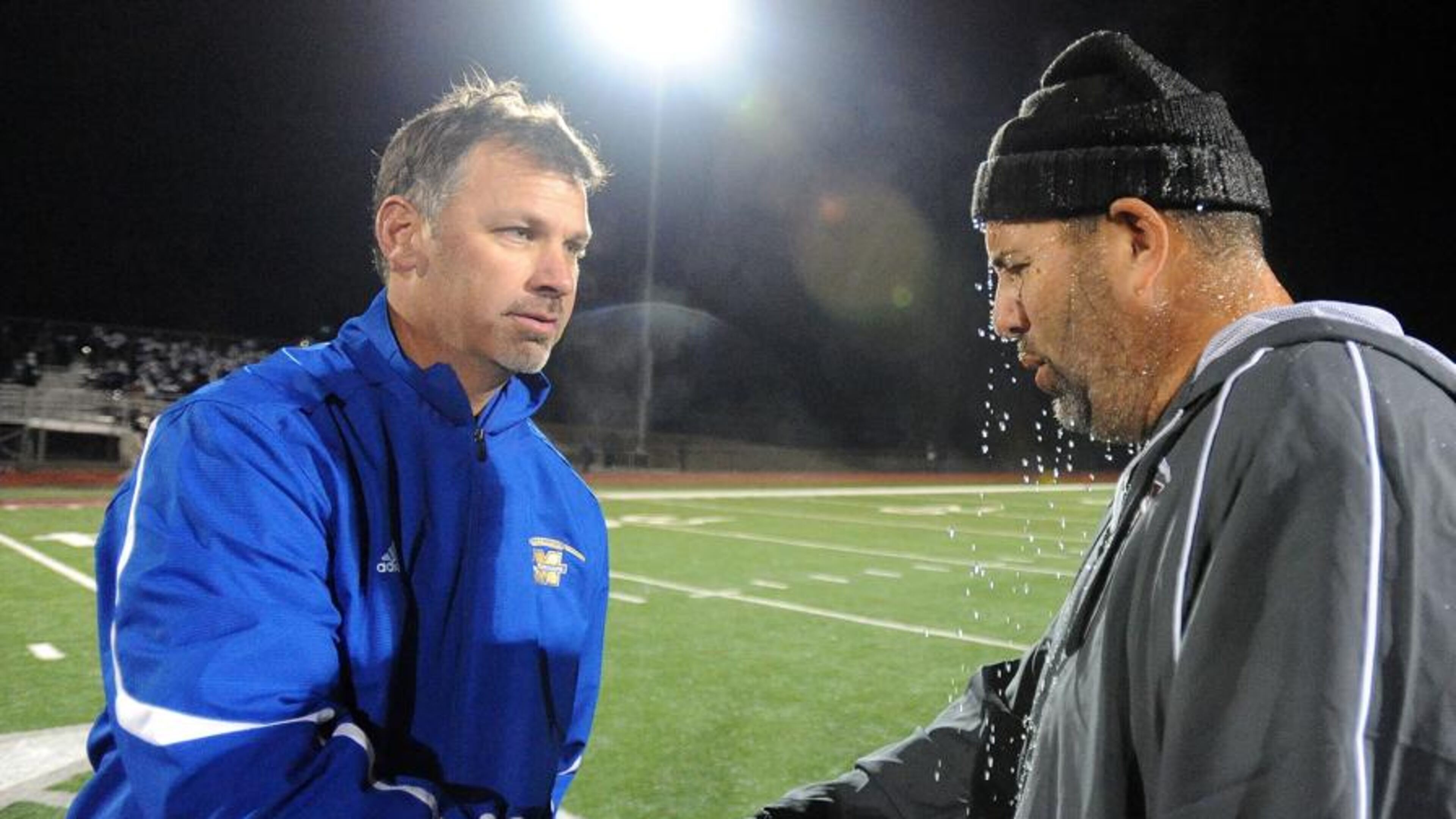 McEachern coach Kyle Hockman (left) and Hillgrove’s Phillip Ironside will meet again Friday at Hillgrove. One or the other has won their region title six of the past seven years.