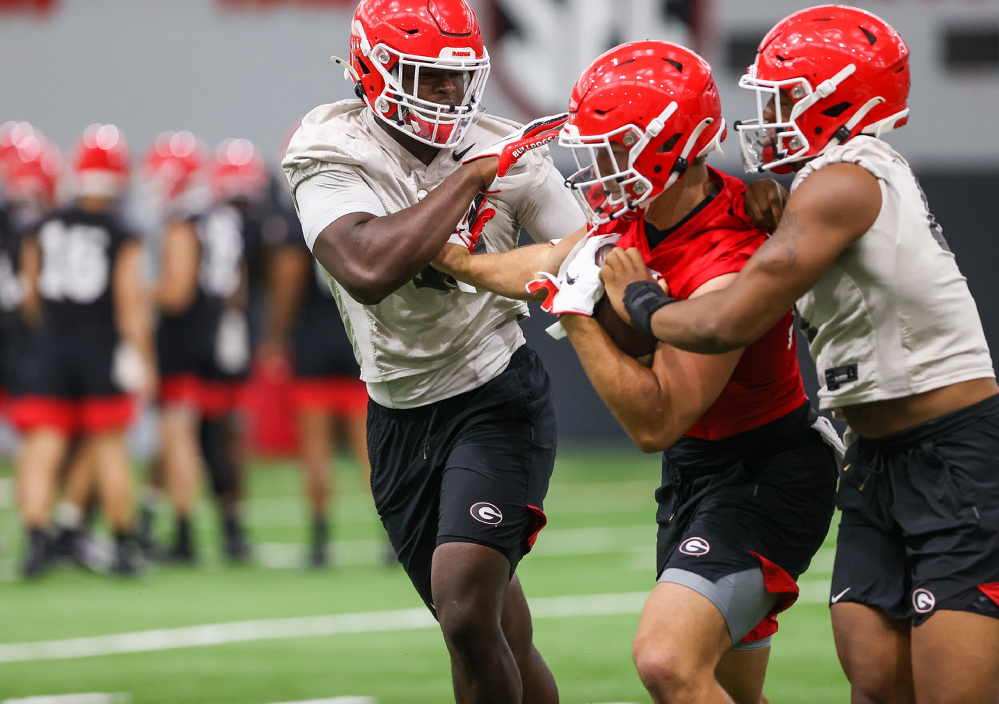 Georgia outside linebacker Azeez Ojulari (13), Georgia tight end Brett Seither (18), Georgia linebacker Nolan Smith (4) during the Bulldogs practice in Athens, Ga., on Mon., Aug. 17, 2020. (Photo by Chamberlain Smith)