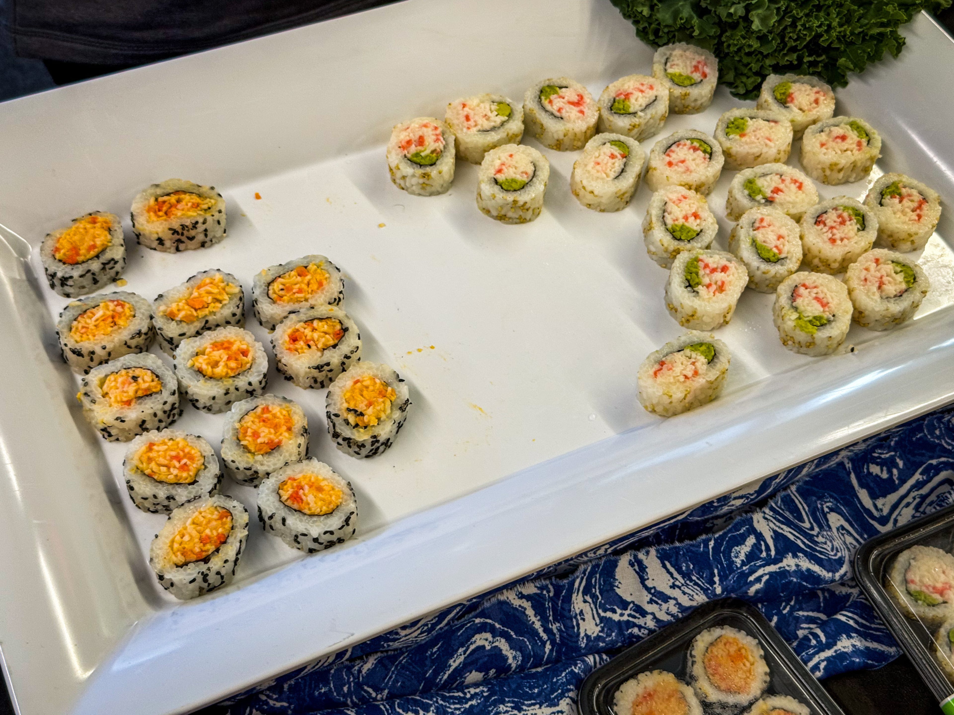 Sushi from the Fulton County Schools kitchen is made with imitation crab, a cooked product. (Henri Hollis/AJC)
