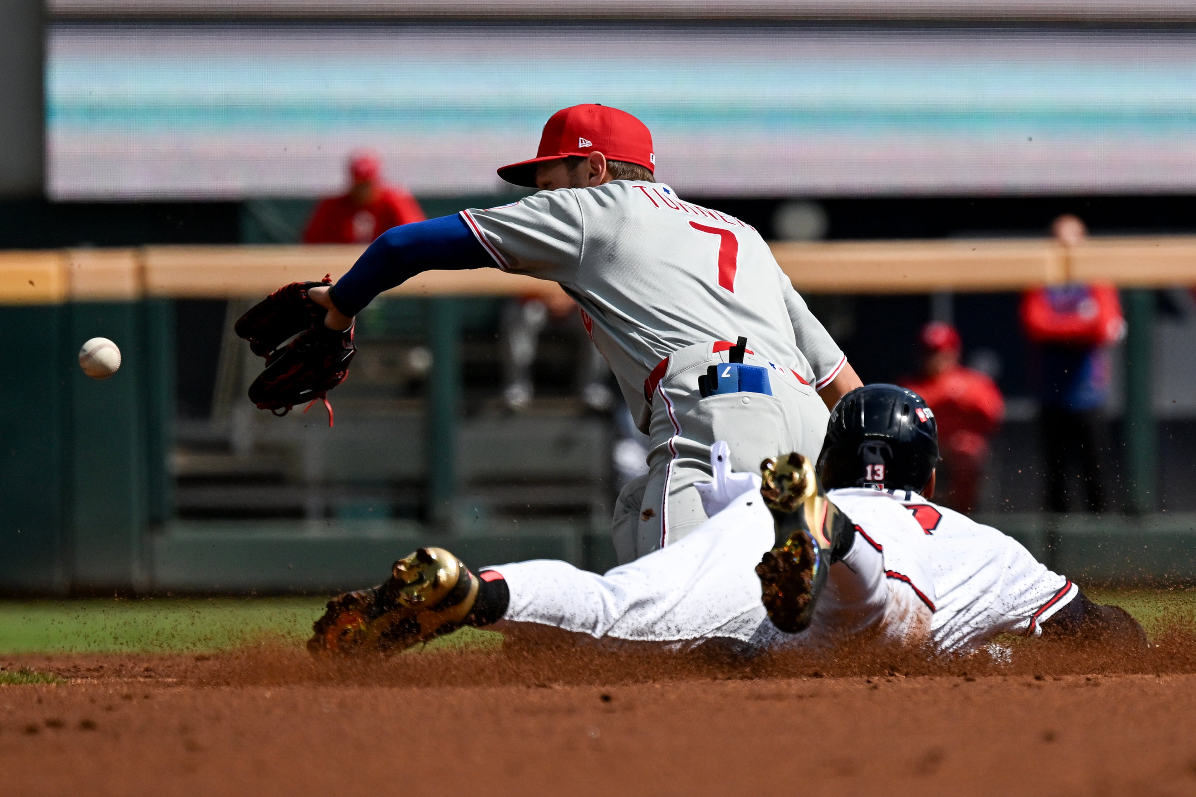 Braves right fielder Ronald Acuña Jr. (right) steals second base against Phillies shortstop Trea Turner during Game 2 of their NL Wild Card Series on Wednesday, Sept. 30, 2026, in Atlanta. (Hyosub Shin/AJC)