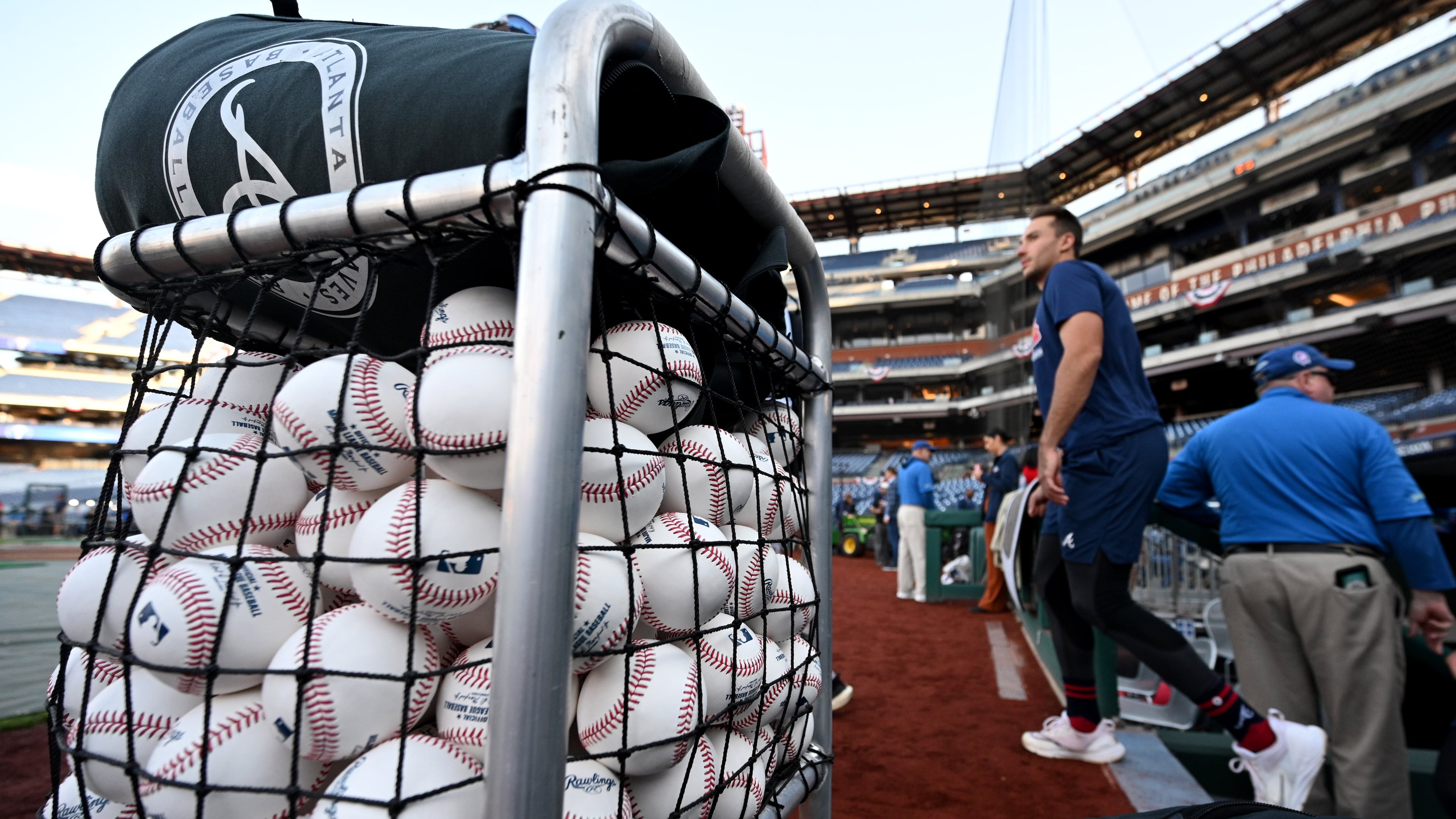 Atlanta Braves first baseman Matt Olson (background) takes on the baseball field for warming up prior to Game 4 of the 2023 National League Division Series at Citizens Bank Park, Thursday, October 12, 2023, in Philadelphia. (Hyosub Shin / Hyosub.Shin@ajc.com)