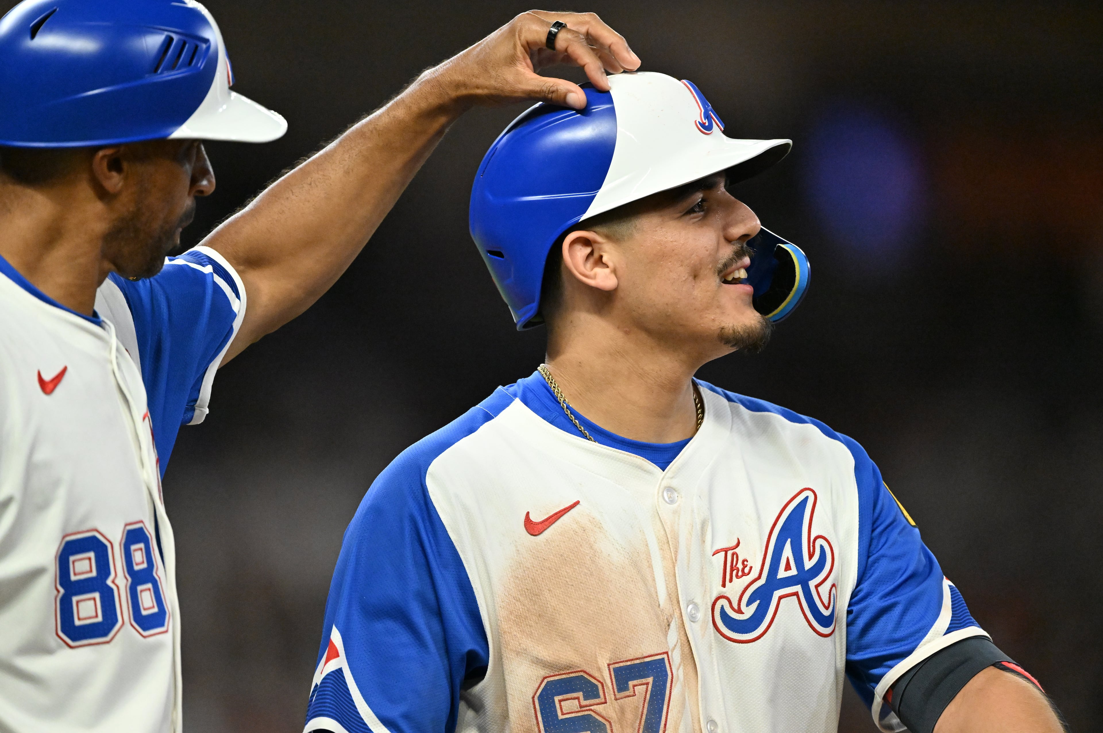Atlanta Braves shortstop Nacho Alvarez Jr. (67) reacts after he was hit by a pitch from New York Yankees pitcher Jonathan Loáisiga (43) during the seventh inning of a baseball game at Truist Park, Saturday, July 19, 2025, in Atlanta. New York Yankees won 12-9 over Atlanta Braves. (Hyosub Shin / AJC)
