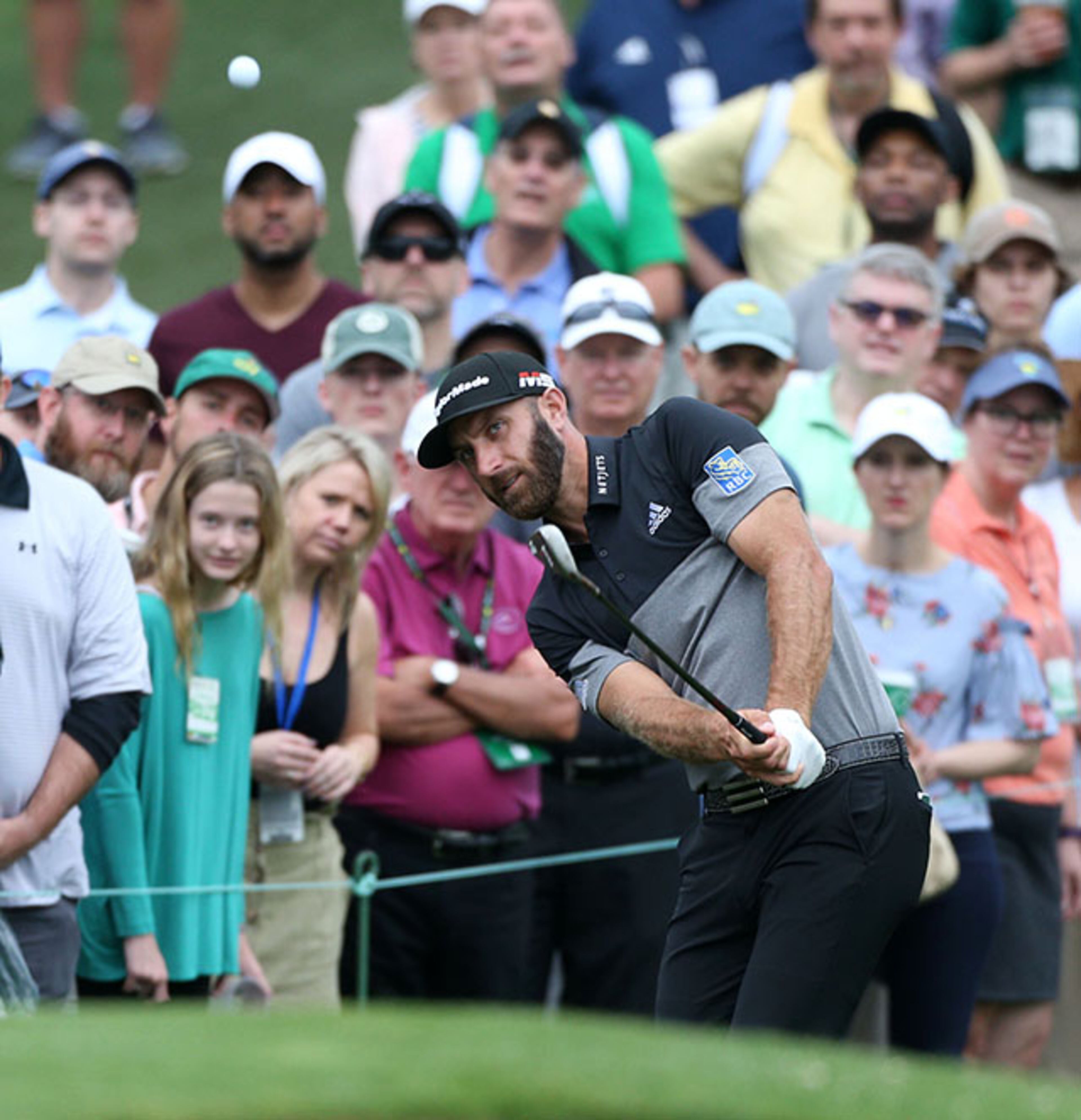 Dustin Johnson chips to the green on 2 during the final round of the Masters Sunday, April 14, 2019, at Augusta National Golf Club in Augusta.
