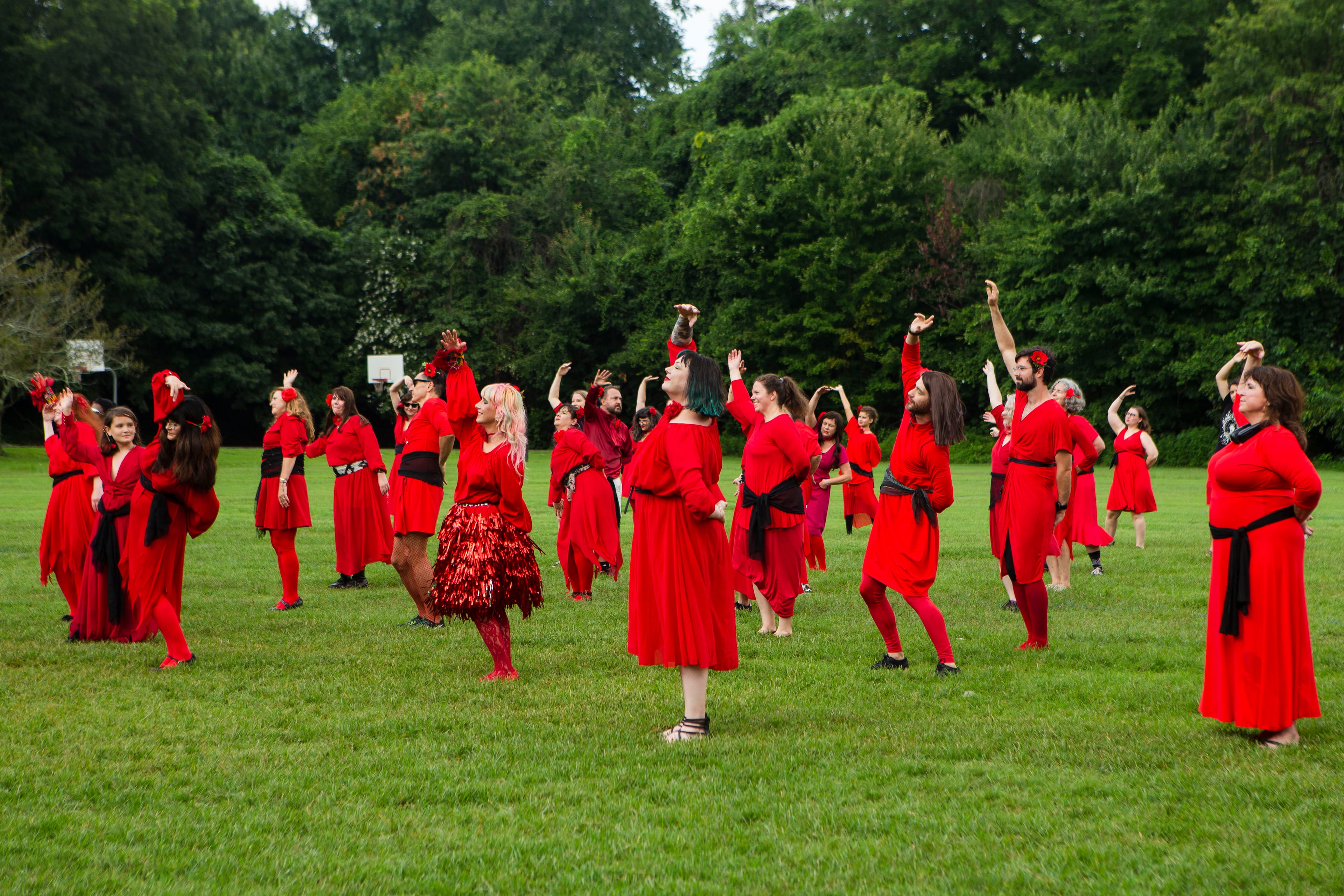 Kate Bush fans dance during a group dance to celebrate the seventh annual international "Most Wuthering Heights Day Ever," on Saturday, July 30, 2022, in Candler Park in Atlanta. The event celebrates Kate Bush's 1978 song "Wuthering Heights" with events in more than 40 cities around the world. CHRISTINA MATACOTTA FOR THE ATLANTA JOURNAL-CONSTITUTION
