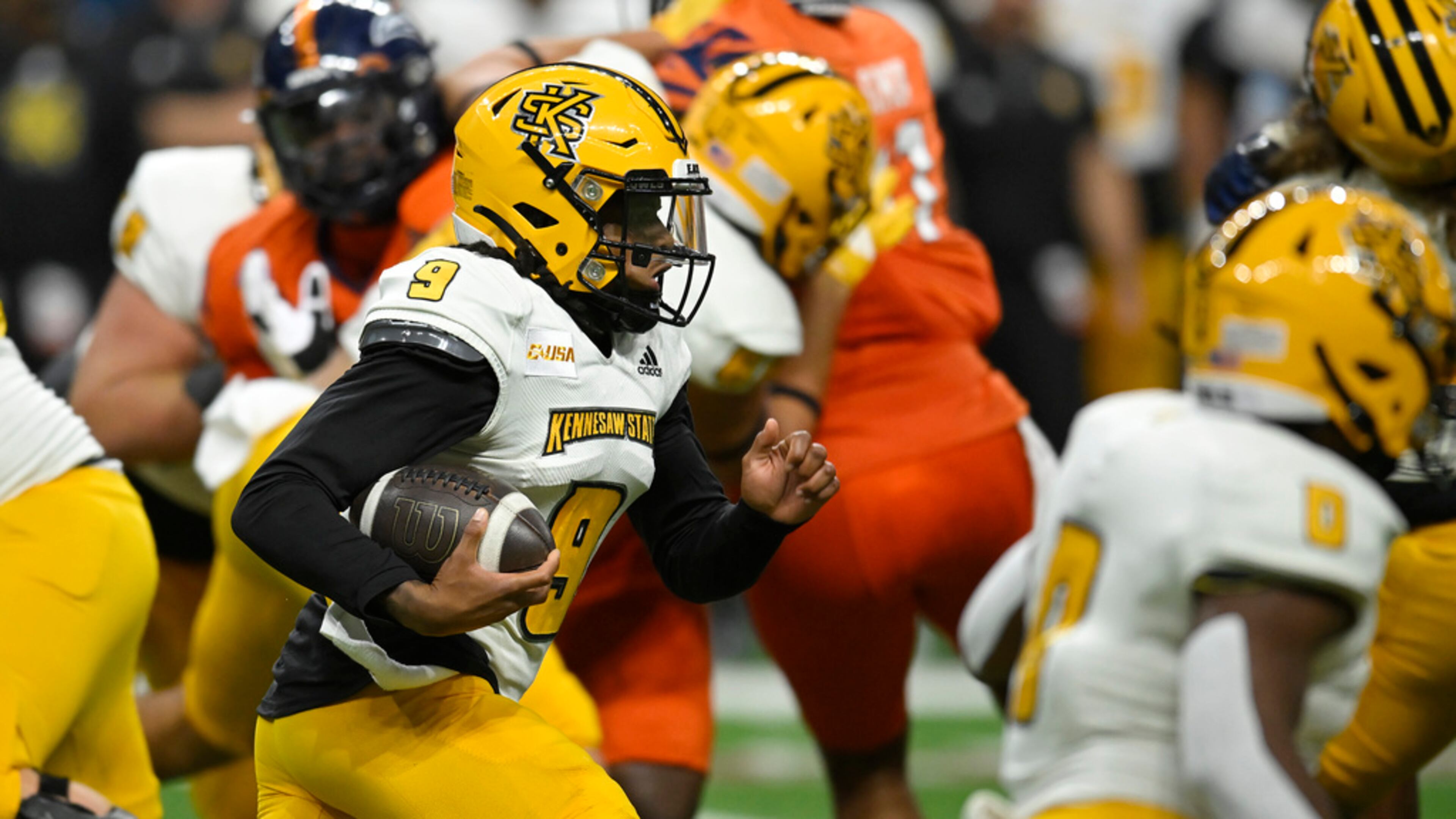 Kennesaw State quarterback Davis Bryson (9) completed 13 passes Wednesday night. (AP Photo/Darren Abate)