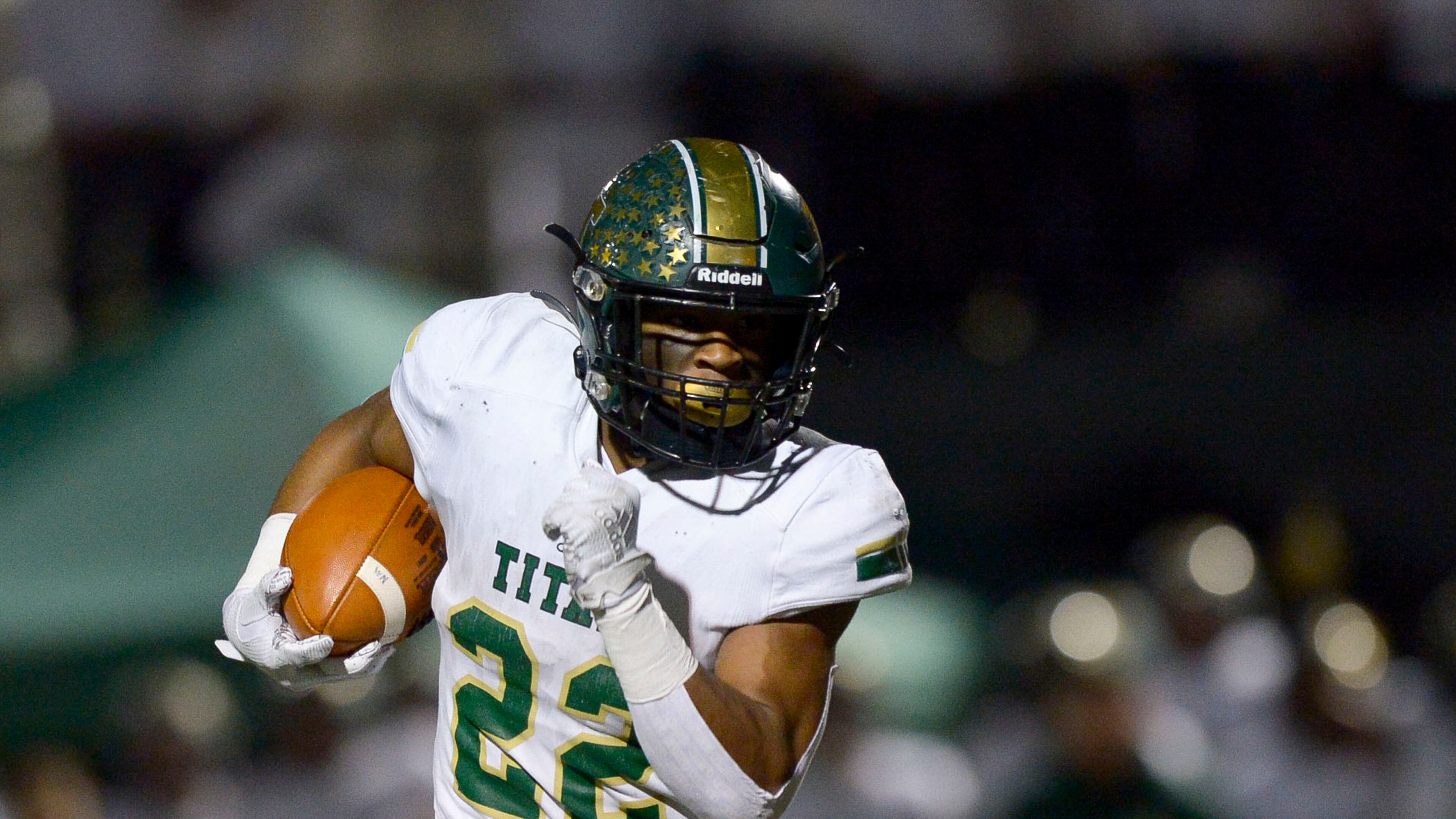 Blessed Trinity running back Justice Haynes carries the ball for yardage in the first half of his class AAAA semifinal game at Woodward Academy Friday, December 6, 2019. PHOTO/Daniel Varnado
