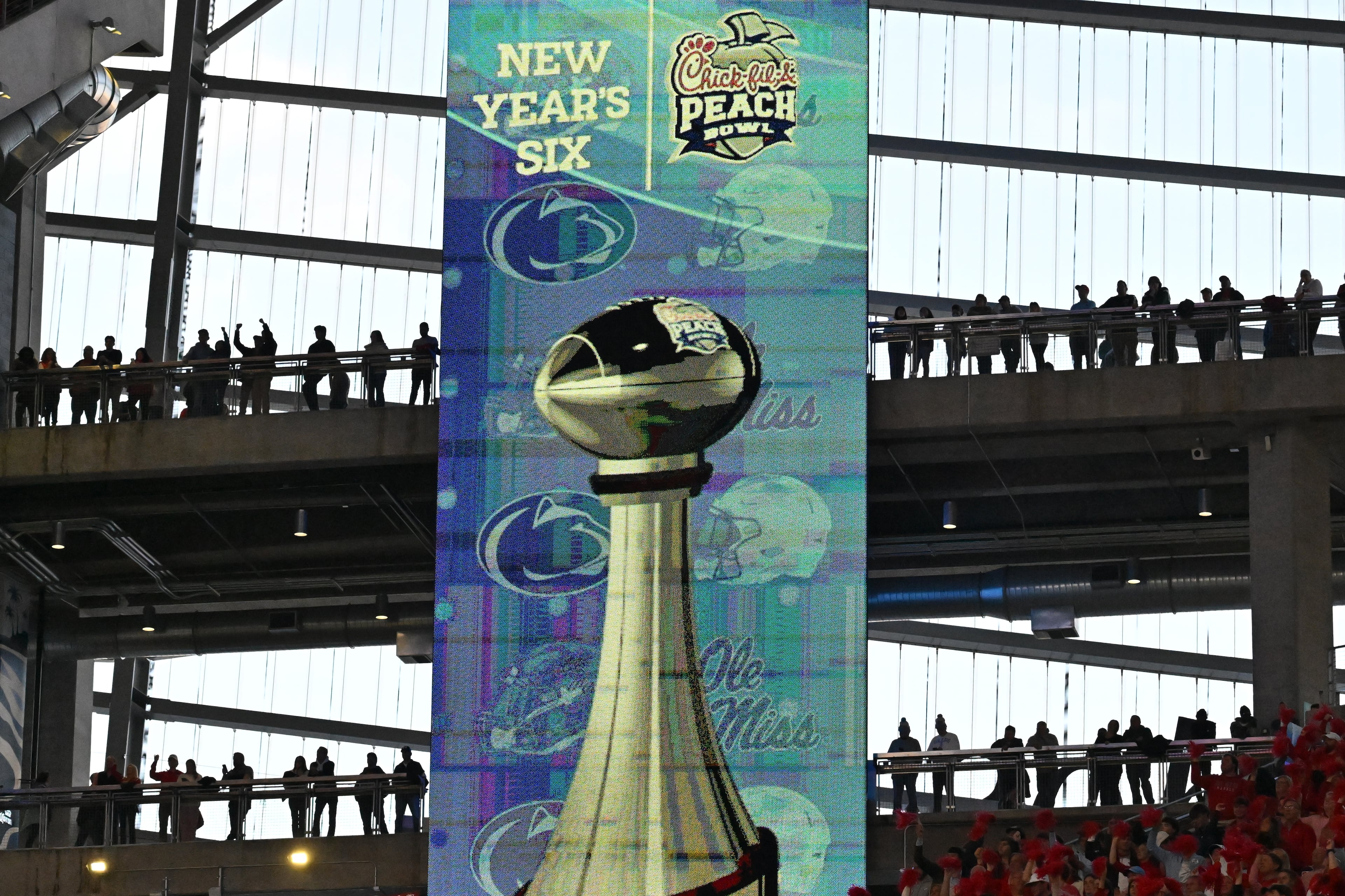 Football fans watch during the second half in 2023 Chick-fil-A Peach Bowl at Mercedes-Benz Stadium, Saturday, December 30, 2023, in Atlanta. Ole Miss won 38-25 over Penn State. (Hyosub Shin / Hyosub.Shin@ajc.com)