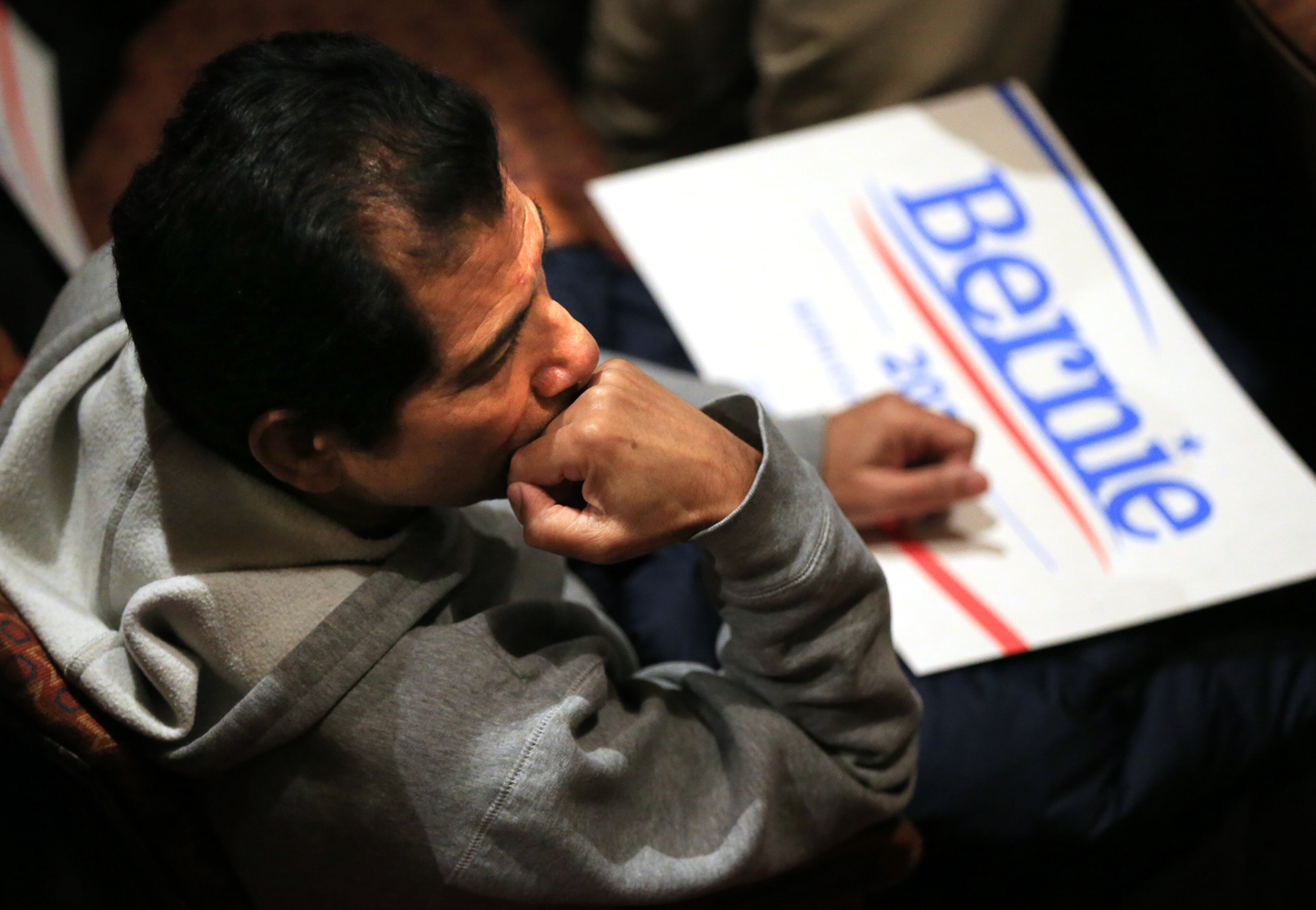 A man in the audience listens intently as Democratic presidential candidate Bernie Sanders delivers his speech at the Fox Theatre on Monday, Nov. 23, 2015, in Atlanta. Curtis Compton / ccompton@ajc.com