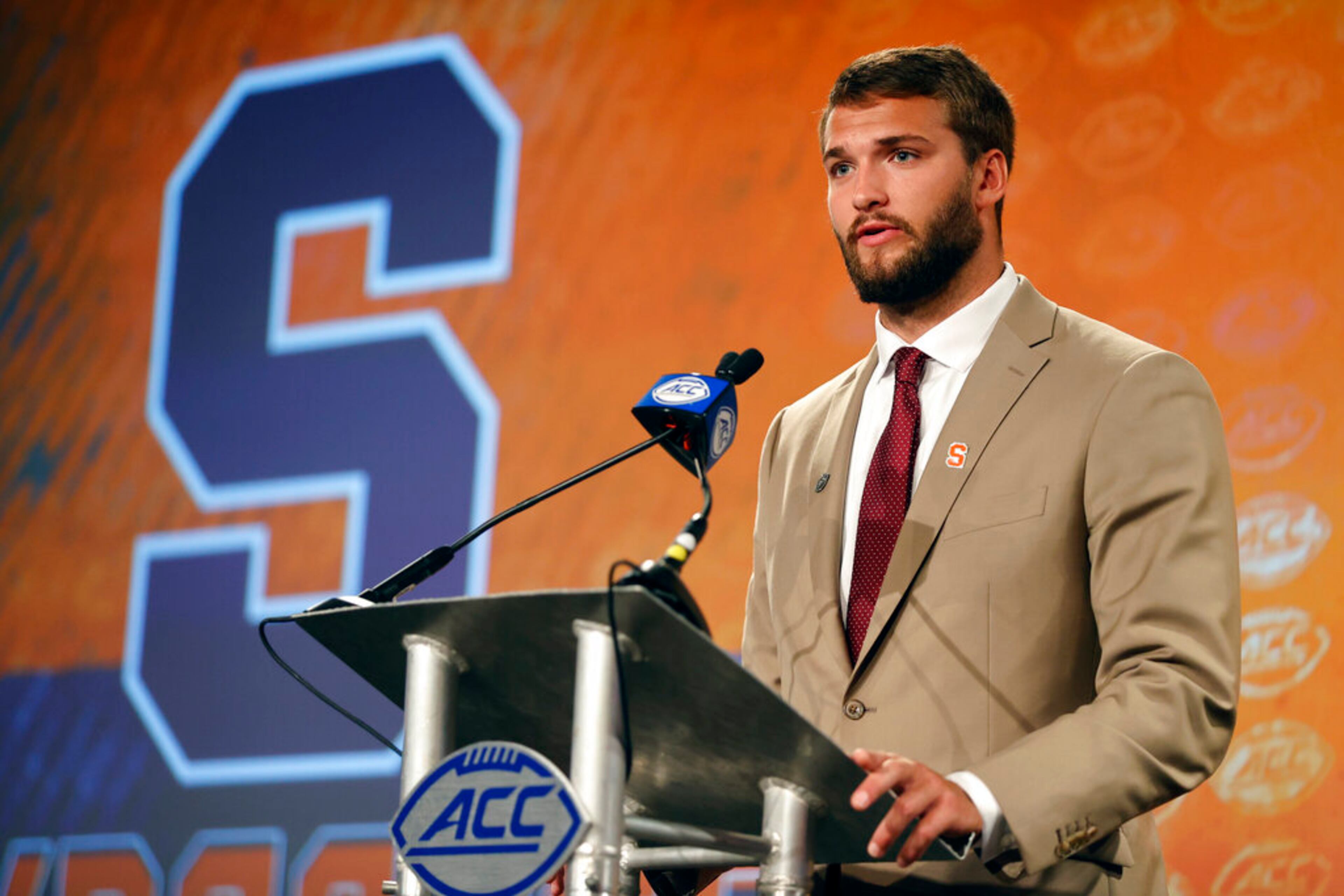 Syracuse quarterback Garrett Shrader answers a question at the NCAA college football Atlantic Coast Conference Media Days in Charlotte, N.C., Wednesday, July 20, 2022. (AP Photo/Nell Redmond)
