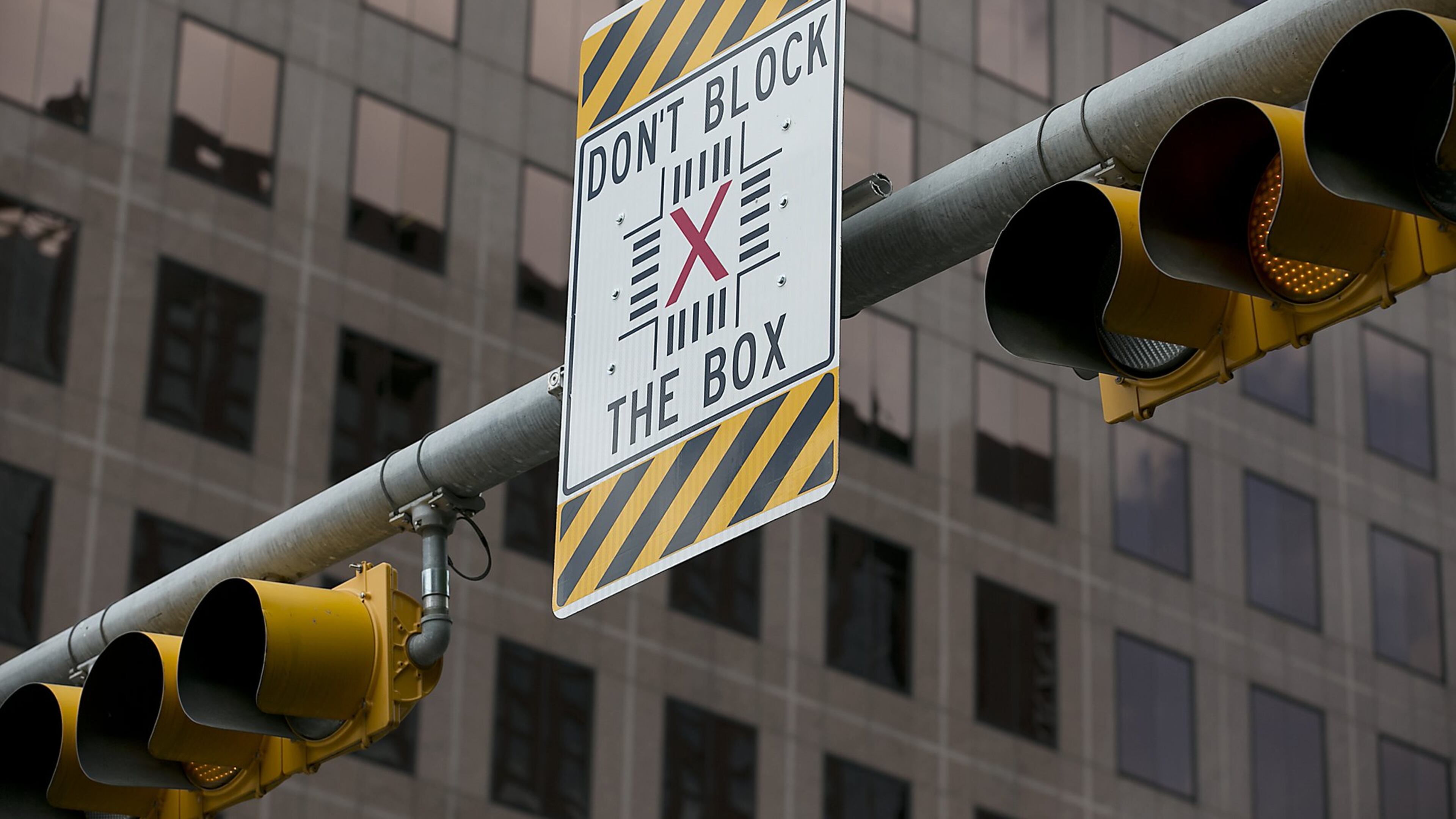 The Gwinnett Department of Transportation recently put up “Don’t Block the Box” signs like the one show in this file photo.