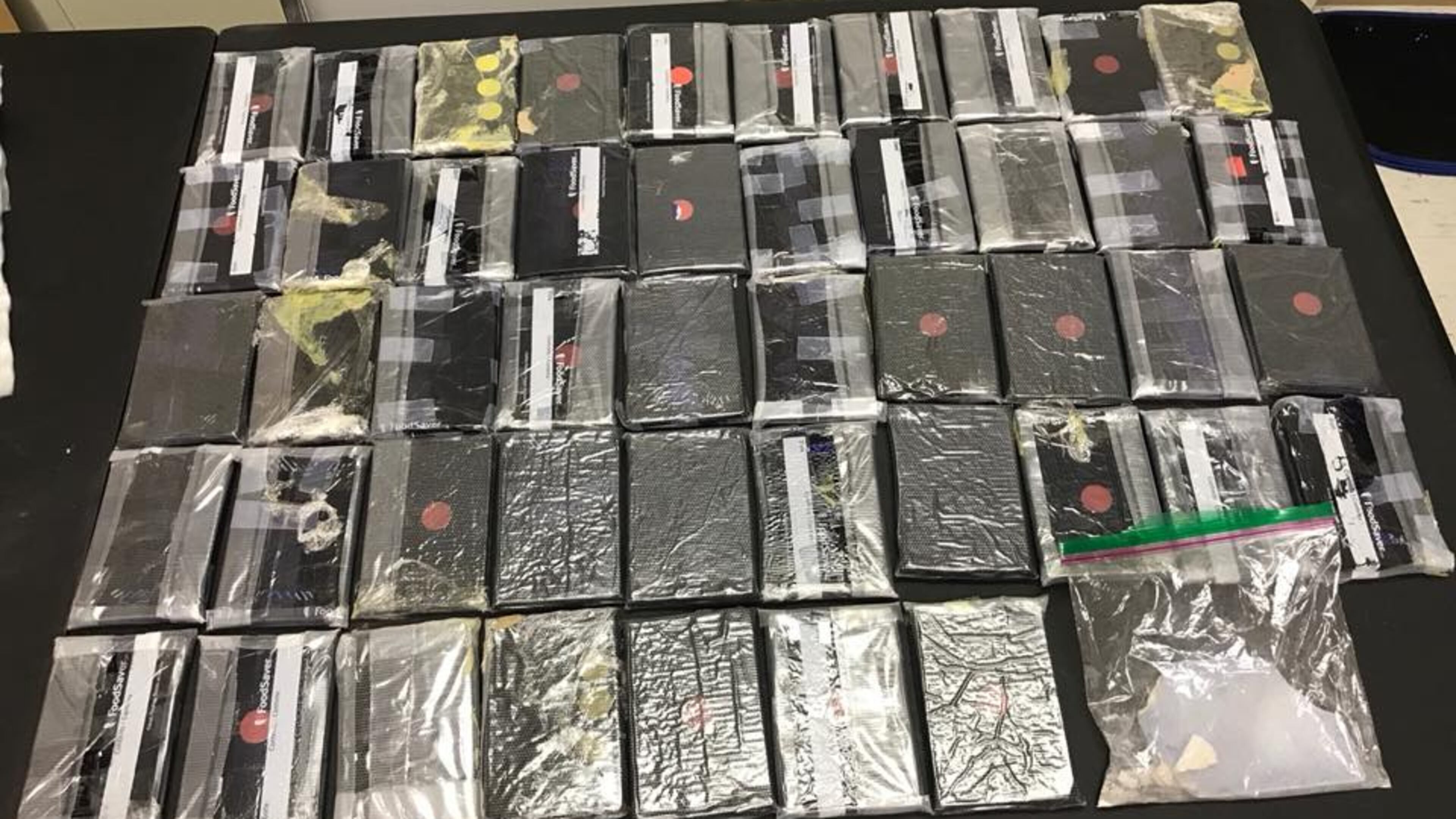 Two people are in custody after about 10 pounds of heroin was seized.