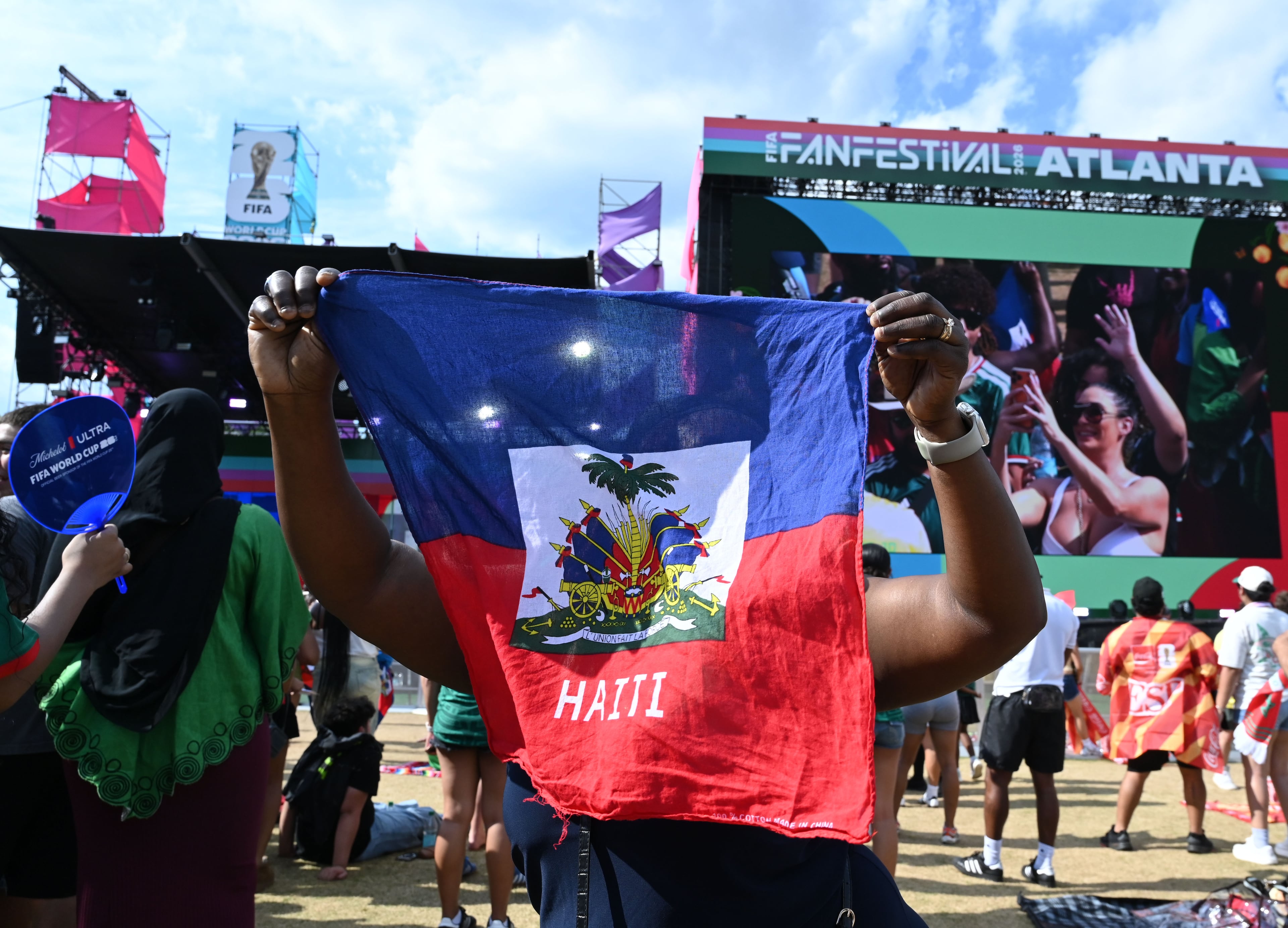 Haiti fans cheer as they gather to watch the match between Morocco vs. Haiti at the FIFA Fan Festival in Centennial Olympic Park on Wednesday, June 24, 2026, in Atlanta. (Hyosub Shin/AJC)