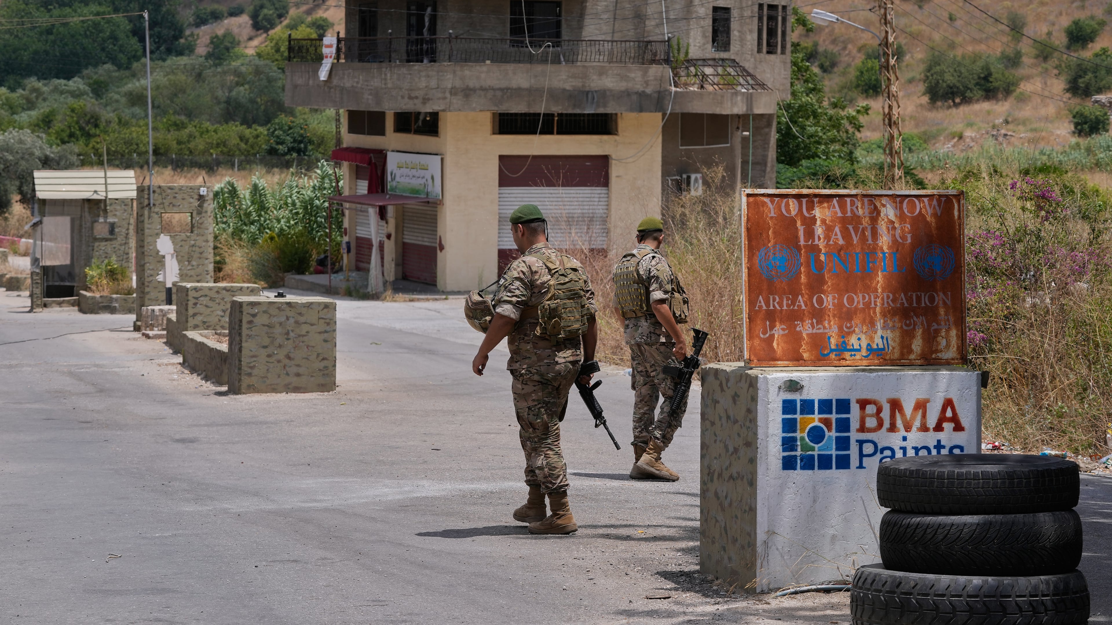 Lebanese army soldiers stand at a checkpoint in Froun village, southern Lebanon, Thursday, July 16, 2026. (AP Photo/Mohammed Zaatari)