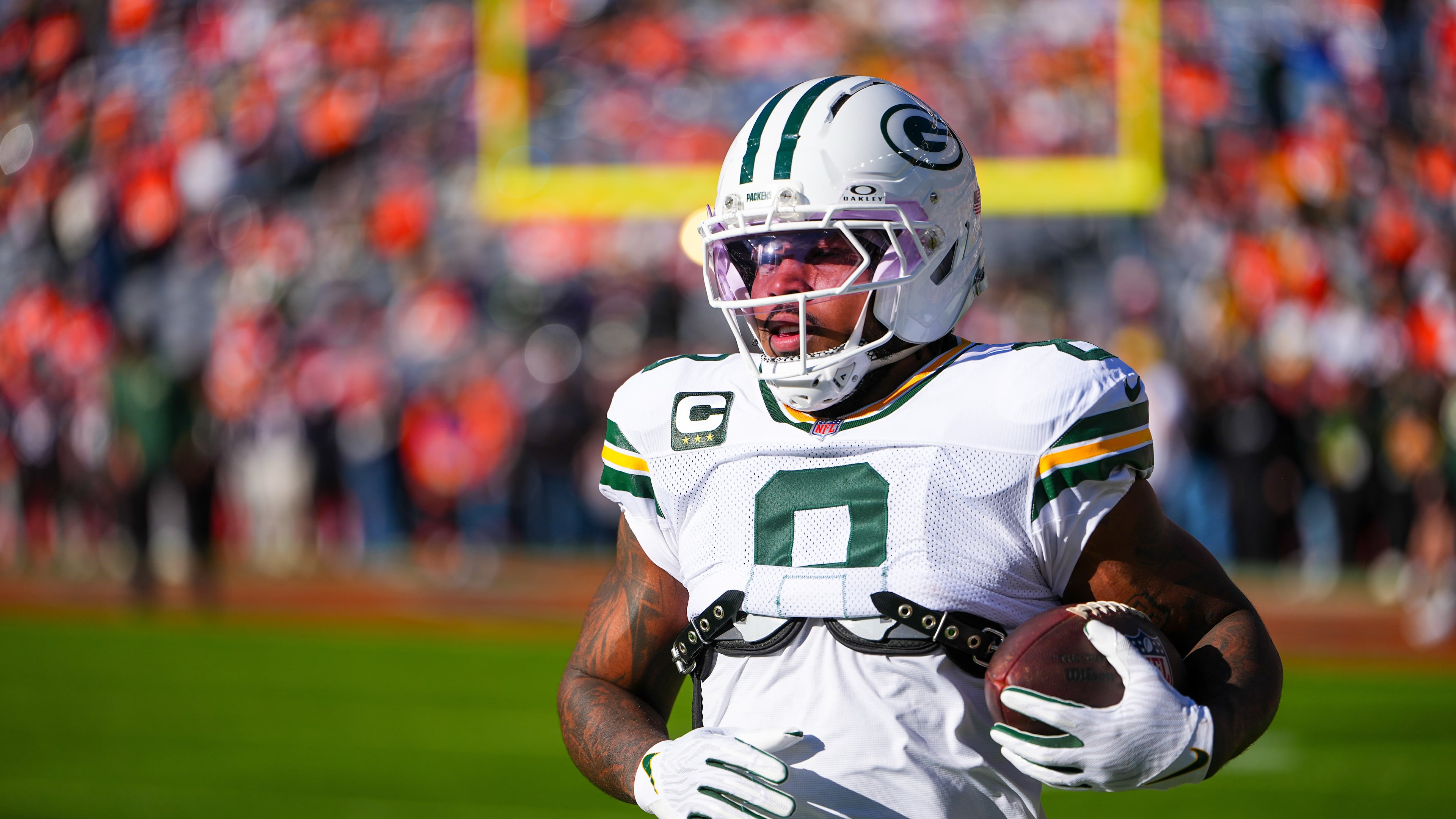 FILE - Green Bay Packers running back Josh Jacobs warms up before an NFL football game against the Denver Broncos, Dec. 14, 2025, in Denver. (AP Photo/Jack Dempsey, File)
